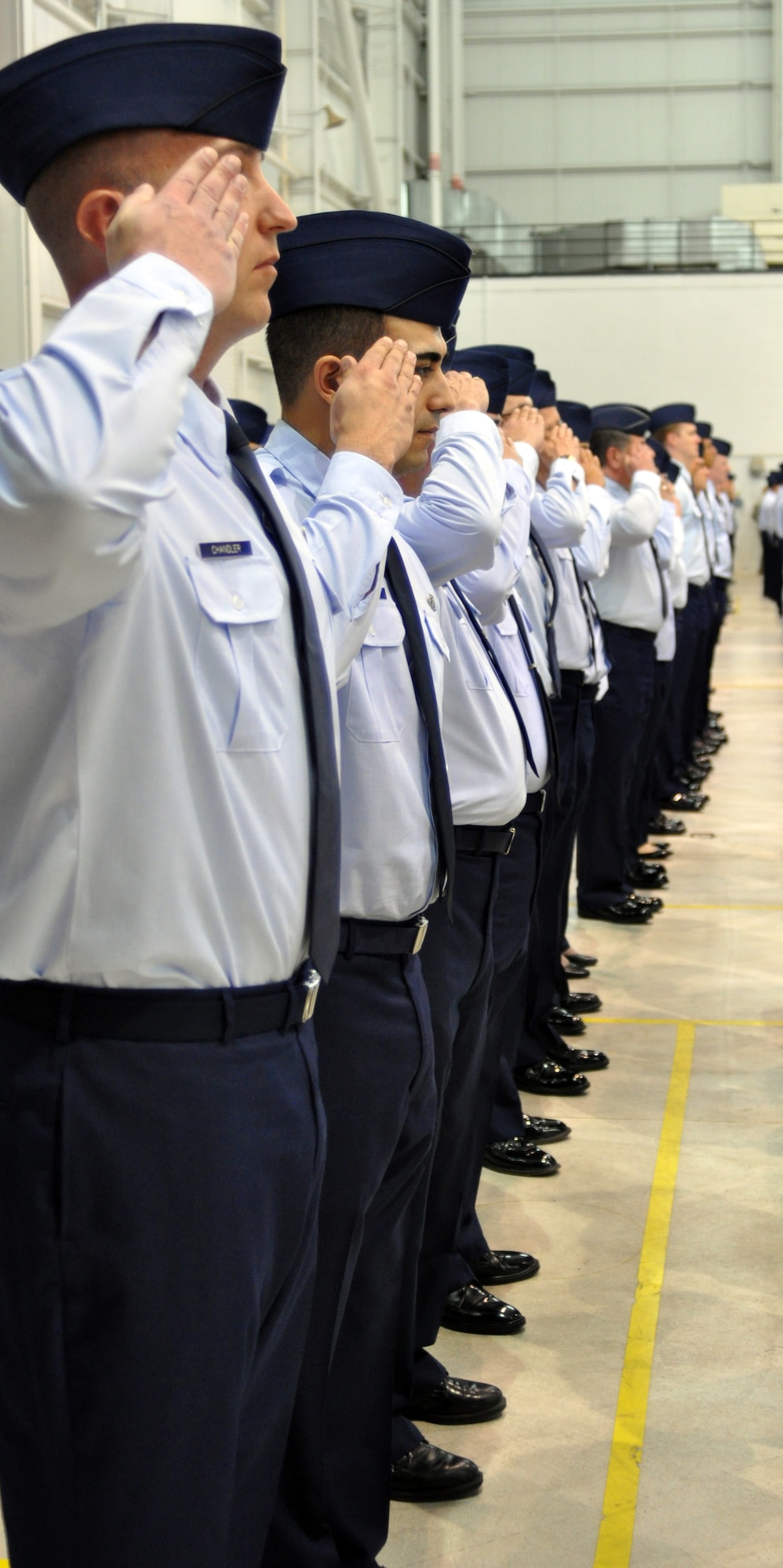 Fourth Air Force Airmen in formation render a salute during a change of command ceremony at March Air Reserve Base, Calif., March 12, 2011.  Brig. Gen. Mark A. Kyle assumed command of 4th Air Force, taking the place of former commander, Maj. Gen. Eric W. Crabtree. (U.S. Air Force photo/Master Sgt. Linda Welz)