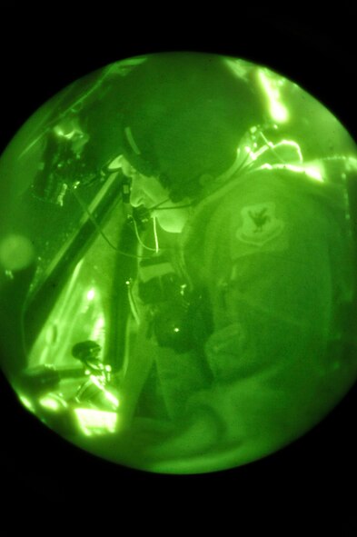 Capt. Thomas Stengl, an HH-60 Pavehawk pilot with the 33rd Rescue Squadron completes pre-flight checks before heading to mainland Japan at Kadena Air Base, March 13. The 33rd RQS will be assisting in search and rescue following the earthquake and tsunami that struck mainland Japan. (U.S. Air Force photo/Staff Sgt. Lakisha A. Croley)