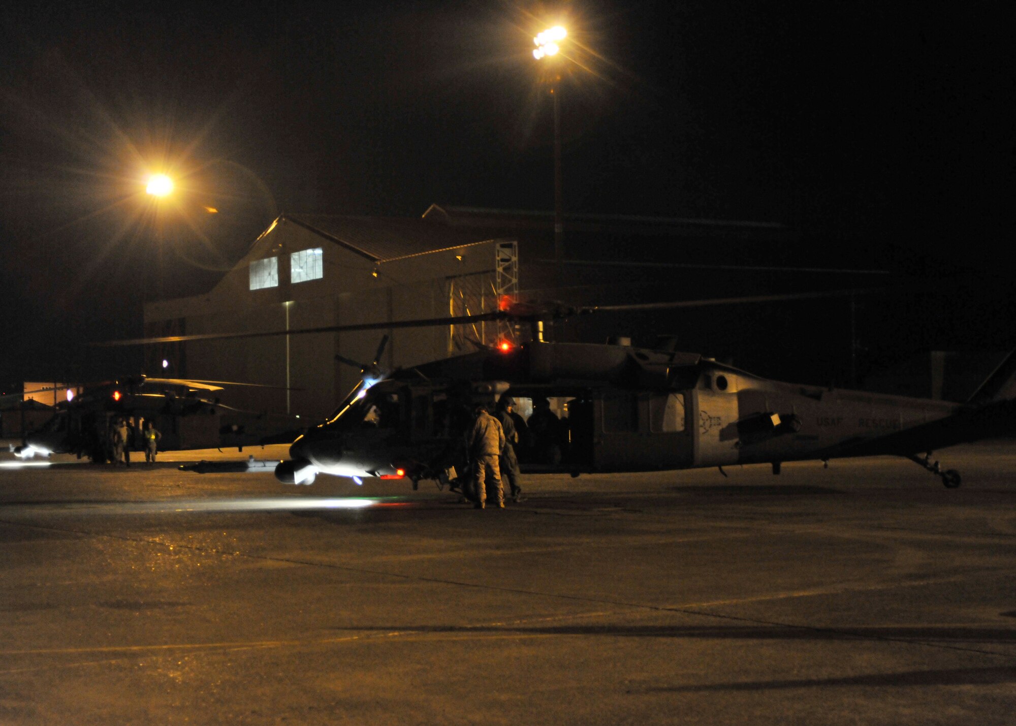 YOKOTA AIR BASE, Japan -- HH-60G Pave Hawk helicopters arrive here March 12 as part of the first wave of American disaster relief forces and aircraft to assist with Japan's earthquake and tsunami recovery effort.  (U.S. Air Force photo/Master Sgt. Kimberly Spinner)
