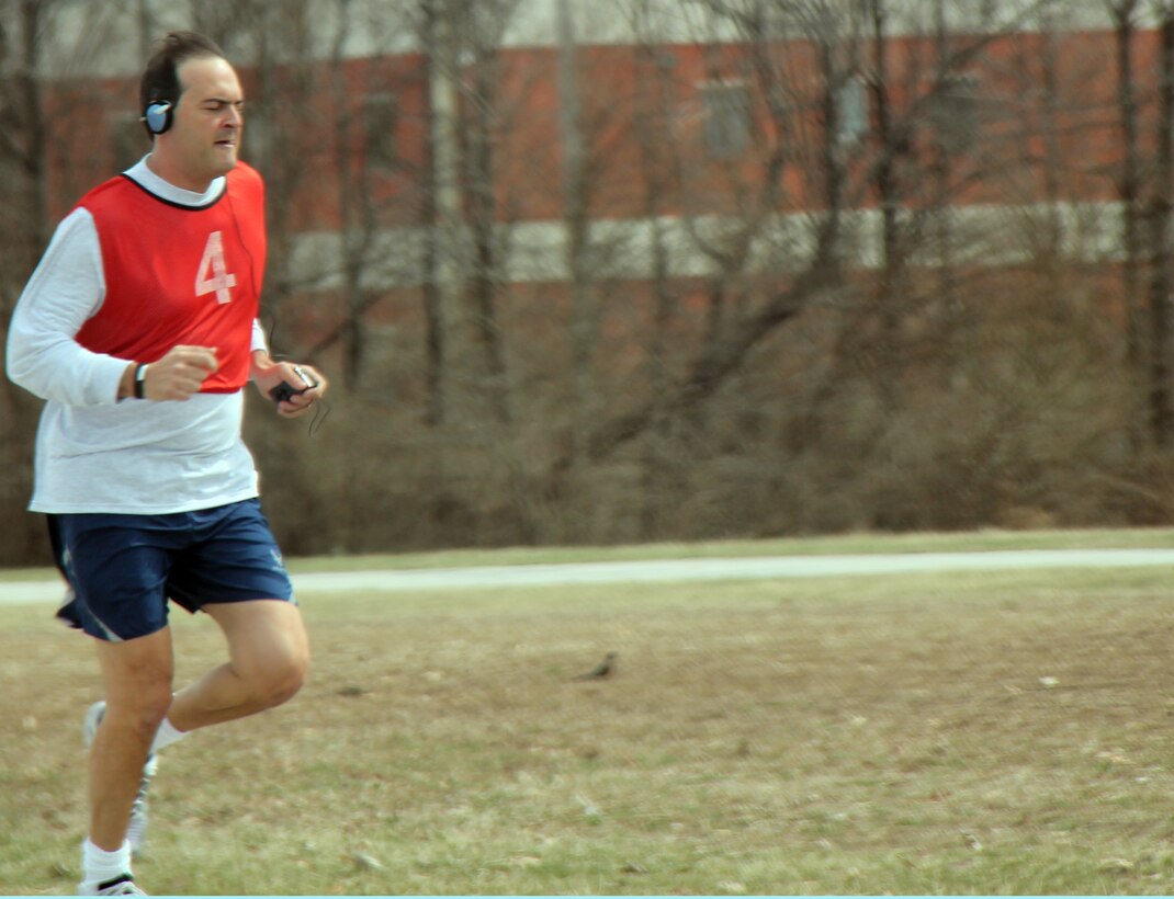 A 932nd Airlift Wing member performs the 1.5 mile run as part of the Fitness Assessment Test. Air Force Reservists are also tested on push-ups, sit-ups and their waistlines (abdominal circumference) are measured.  (U.S. Air Force photo/Tech. Sgt. Dan Oliver)  