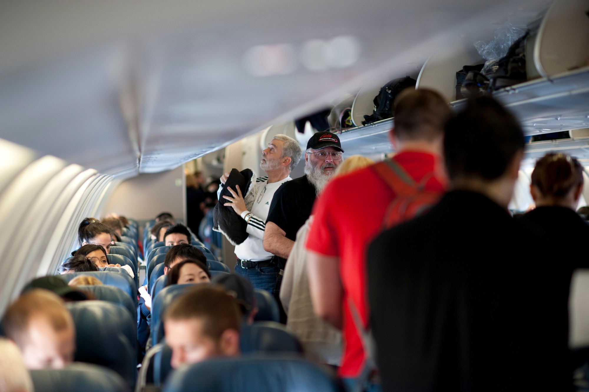 YOKOTA AIR BASE, Japan -- Passengers board a Delta Air Lines aircraft here March 12. The aircraft was diverted to Yokota from Narita International Airport in Tokyo, Japan, after an 8.9 magnitude earthquake struck off the eastern coast of Japan. (U.S. Air Force photo by Staff Sgt. Samuel Morse)