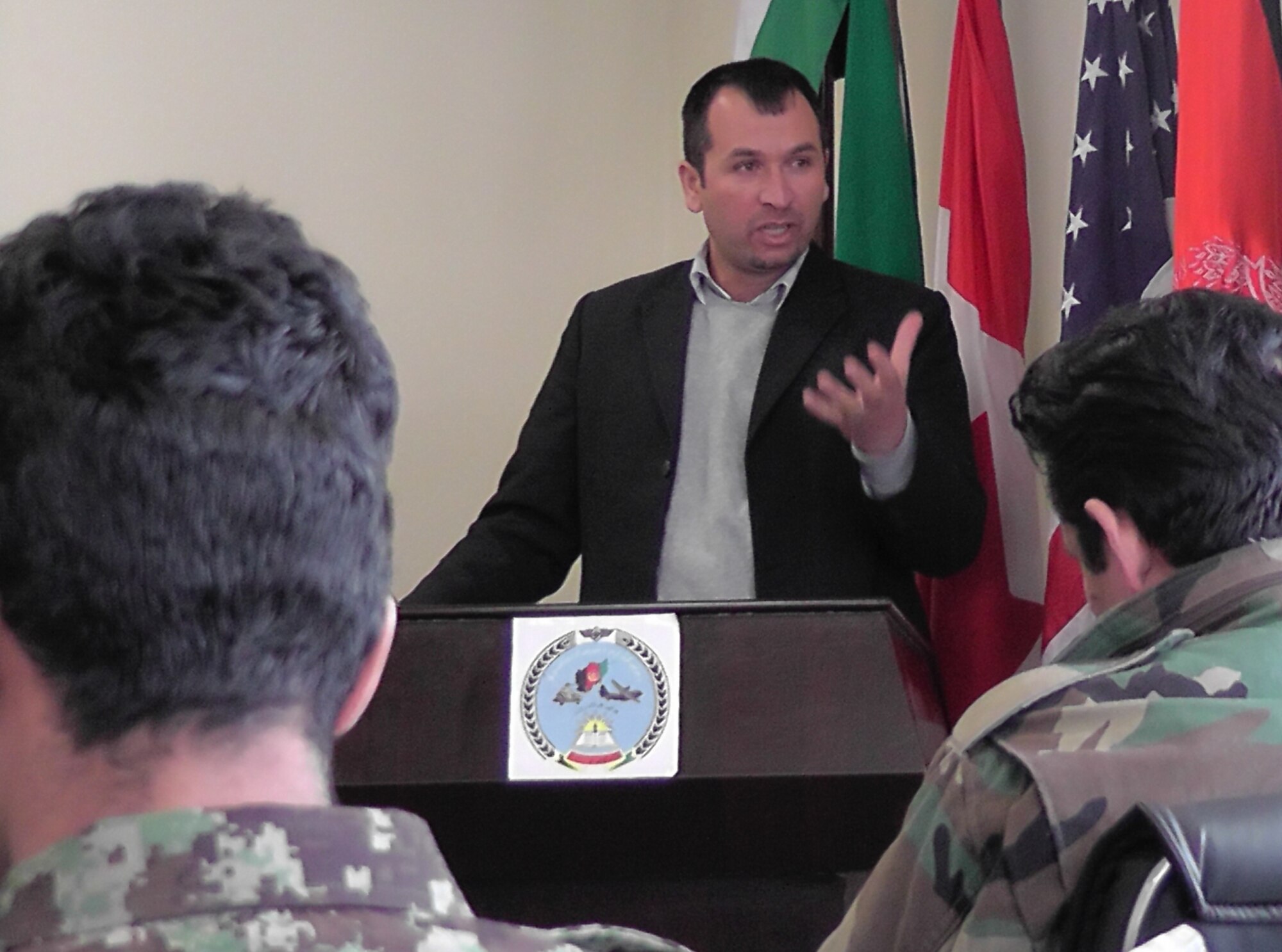 KABUL, Afghanistan - Lt Temor Shah Rigiwal, Aerial Technical Group PeH Program Manager and Liaison officer, speaks to the fifteen members of the Afghan Air Force who graduated from the pre-undergraduate flight indoctrination at Pohantoon-e-Hawayee, the Afghan Air Force's "Big Air School", on the Afghan Air Force base in Kabul, Afghanistan Mar. 10. (U.S. Air Force photo by Capt. Rob Leese)