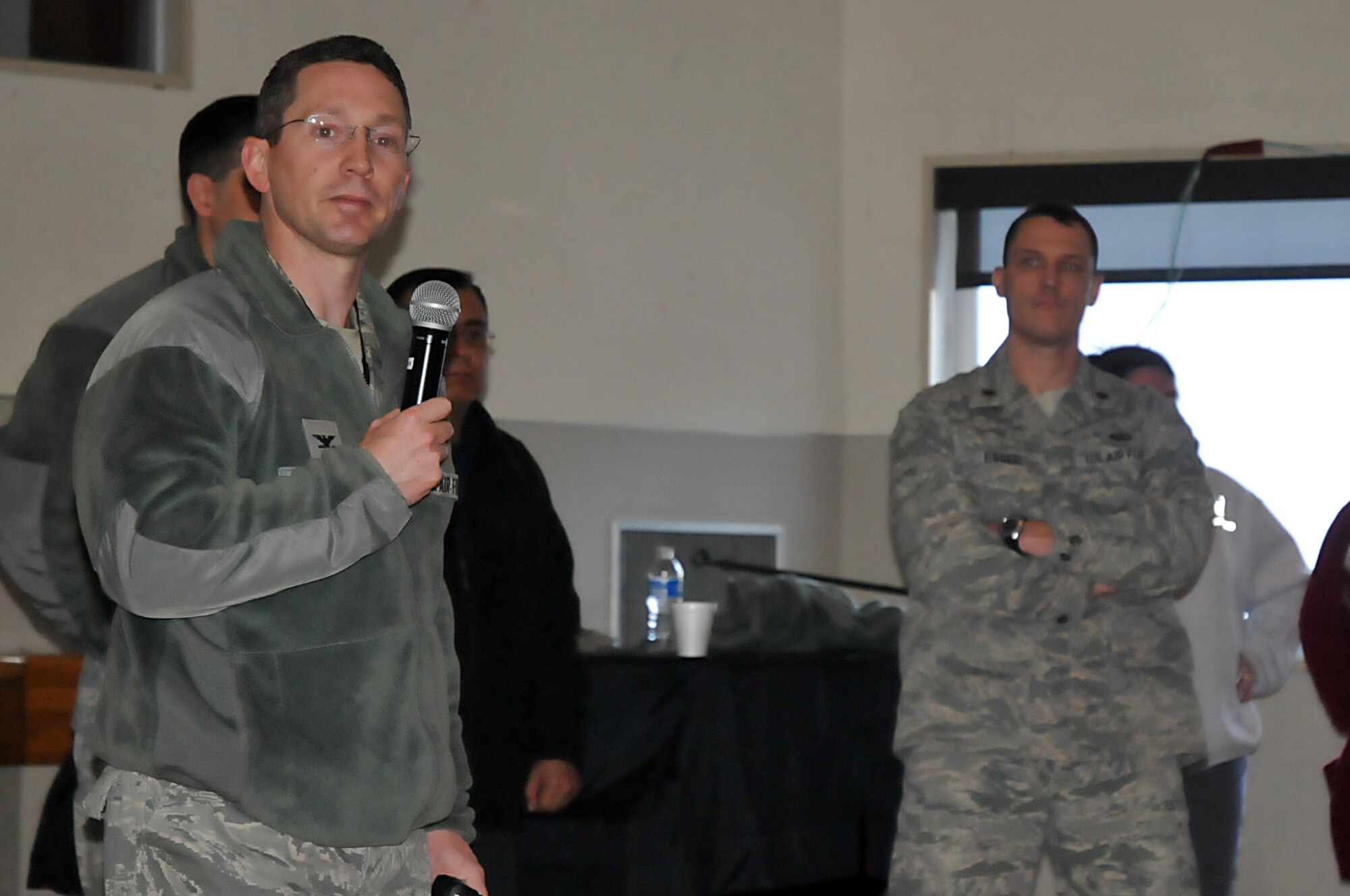 MISAWA AIR BASE, Japan -- Col. Michael Rothstein, 35th Fighter Wing commander, briefs base residents in the emergency family assistance control center Mar. 12. The EFACC was stood up to allow residents to get updated information, make calls home and get hot food. (U.S. Air Force photo by Staff Sgt. Marie Brown\Released)
