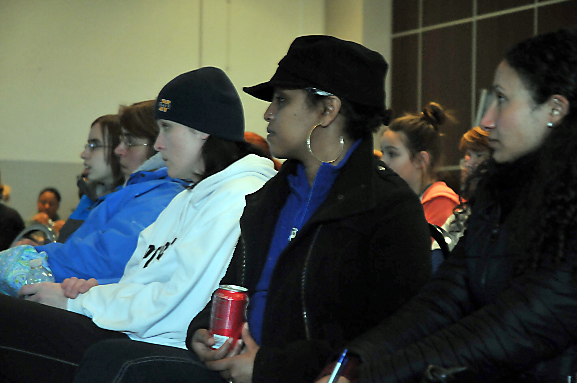 MISAWA AIR BASE, Japan -- Base residents listen to briefers as they get the current updated information in the emergency family assistance control center Mar. 12. Misawa was affected with power outages after an 8.9 magnitude earthquake hit 100 miles off the northern coast of Japan Mar. 11, 2011. (U.S. Air Force photo by Staff Sgt. Marie Brown\Released)
