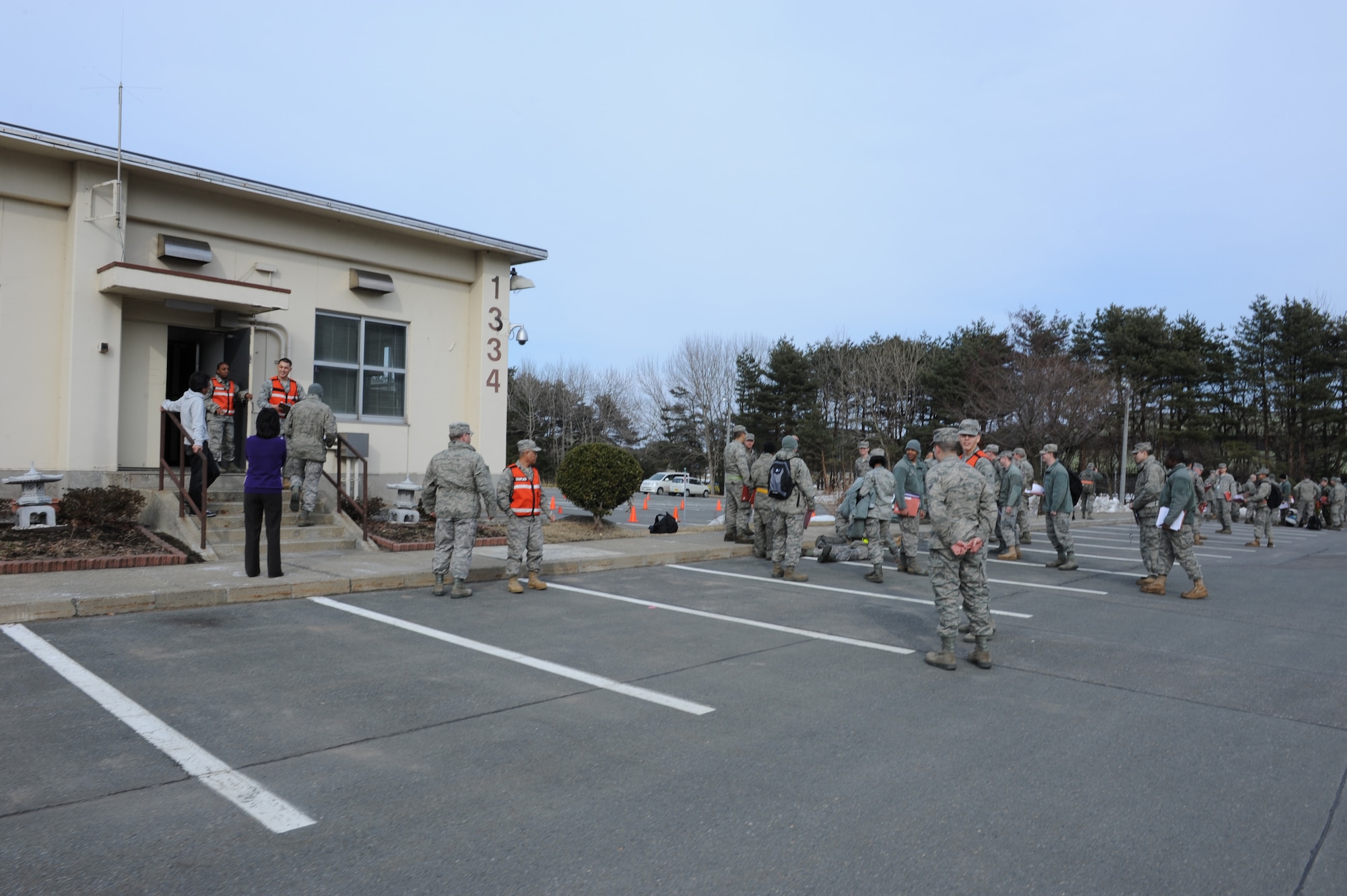 MISAWA AIR BASE, Japan -- Patrons evacuate after an earthquake was felt here Mar. 11. An 8.9 magnitude earthquake hit 100 miles off the coast of northern Japan and is on record as being the worst earthquake in the history of Japan. (U.S. Air Force photo by Tech. Sgt. Russell McBride\Released)

