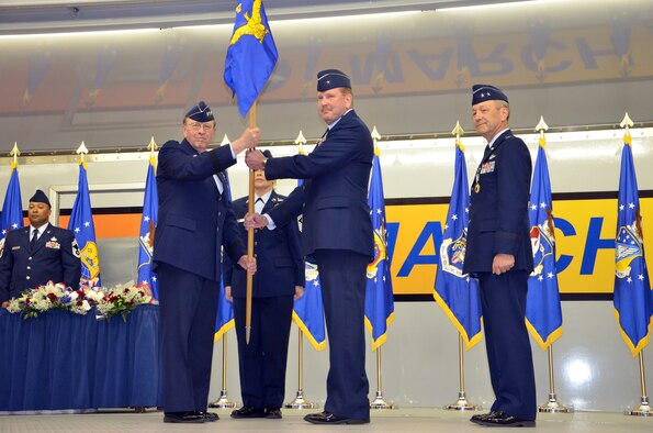 U.S. Air Force Lieutenant General Charles E. Stenner Jr., Chief of Air Force Reserve, Headquarters U.S. Air Force, Washington, D.C. and Commander, Air Force Reserve Command, Robins Air Force Base, Ga., presents Brigadier General Mark A. Kyle with the 4th Air Force guidon.  General Kyle is assumed command of 4th Air Force from Major General Eric W. Crabtree on March 12, 2011.  (U.S. Air Force photo by Technical Sgt. Christine Jones) (released)