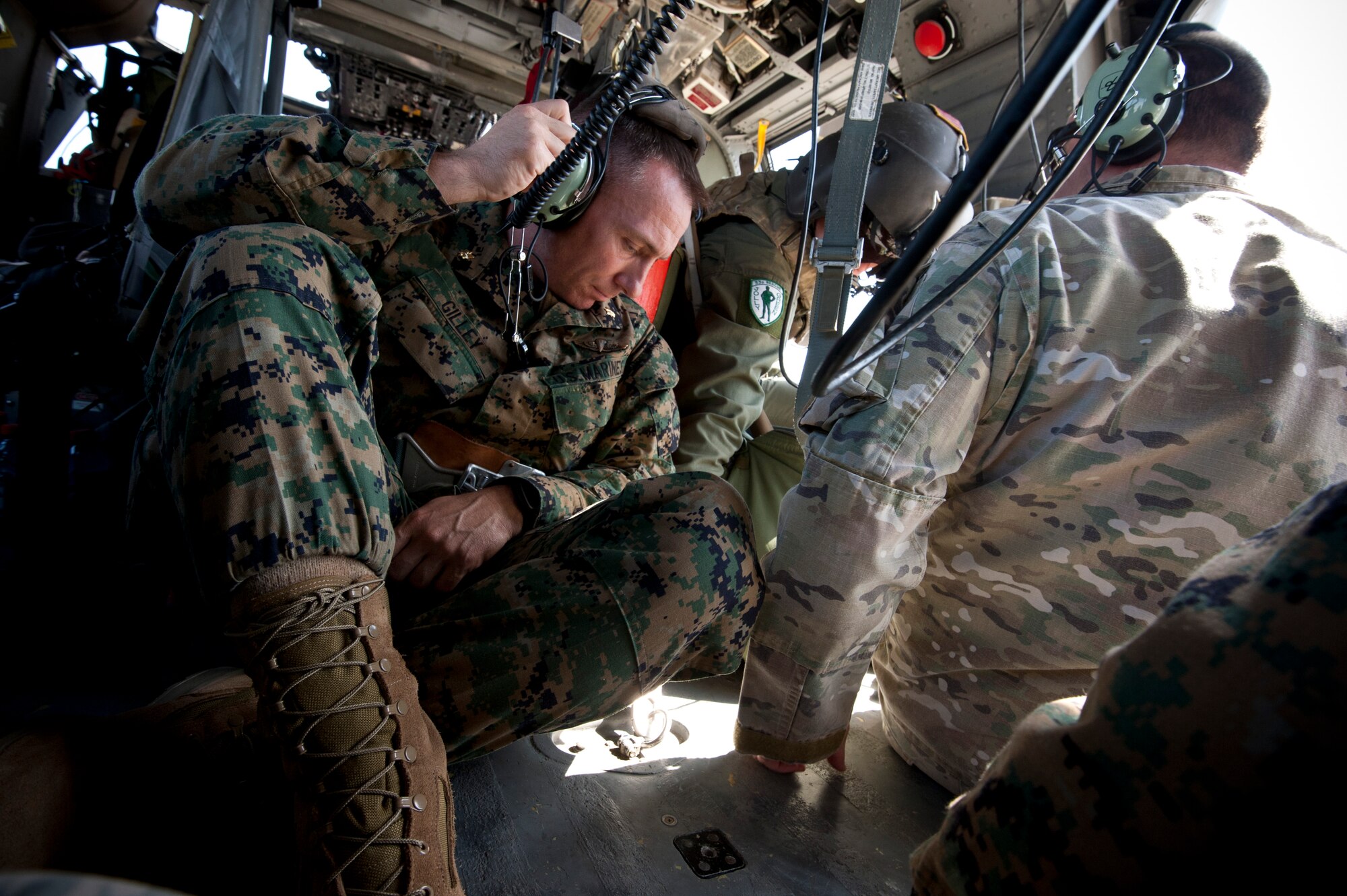 YOKOTA AIR BASE, Japan -- Maj. Tom Gilley, Marine Wing Support Squadron 172, prepares an HH-60 Pave Hawk helicopter from Kadena Air Base for take-off here March 13. They are part of the American disaster relief forces here to assist with Japan's earthquake and tsunami recovery effort. (U.S. Air Force photo/Staff Sgt. Samuel Morse)