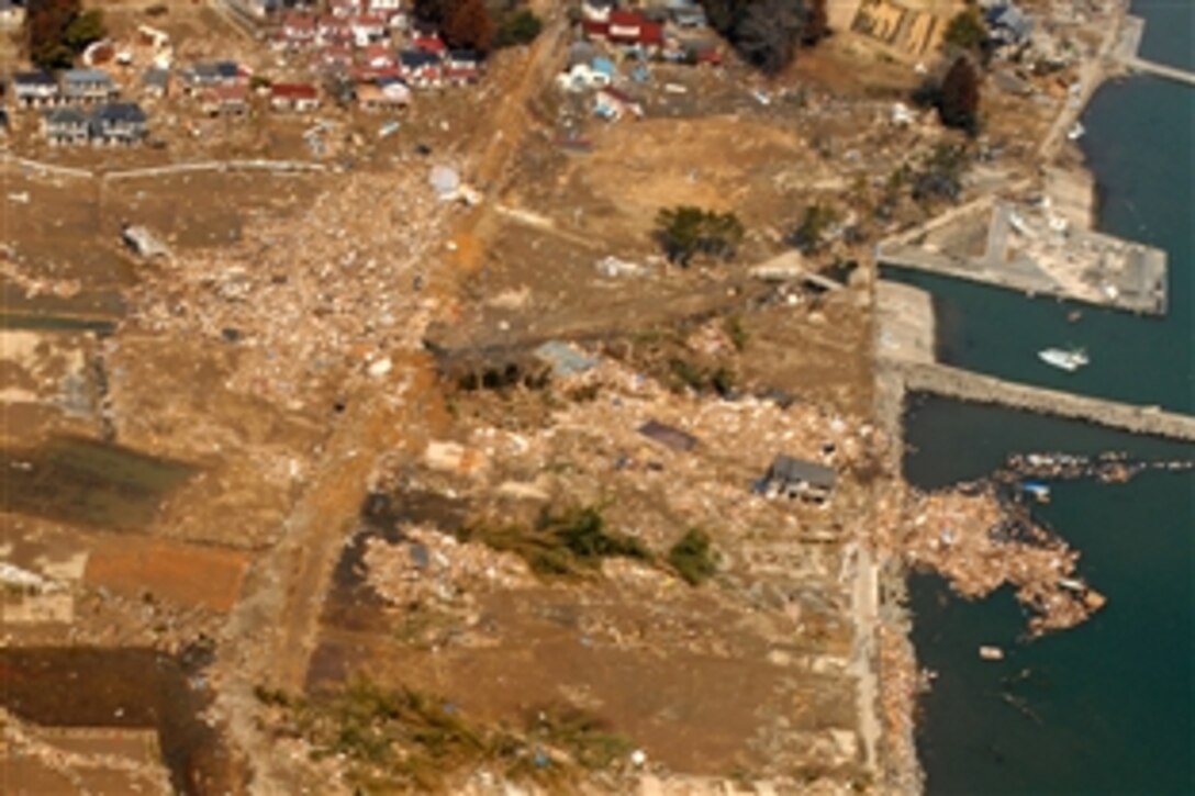 An aerial view of tsunami damage in an area north of Sendai, Japan, March 13, 2011, taken from a U.S. Navy helicopter assigned to the USS Ronald Reagan. The U.S. aircraft carrier was off the coast of Japan rendering humanitarian assistance and disaster relief following an 8.9 magnitude earthquake and tsunami. 