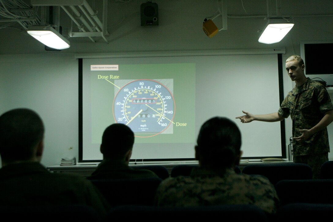 Lance Cpl. Jeffrey Armstrong, a chemical, biological, radiological and nuclear defense specialist with Battalion Landing Team, 2nd Battalion, 5th Marines, 31st Marine Expeditionary Unit, teaches Marines about radiation detection, effects, and treatment, March 14. The 31st MEU continues to prepare for potential humanitarian assistance in support of Operation Tomodachi in mainland Japan.  Marines and sailors of the 31st MEU are making preparations for disaster relief efforts after an 8.9 earthquake and subsequent tsunami struck Japan causing widespread damage. The 31st MEU is heading to Japan to be ready to provide support if called upon.