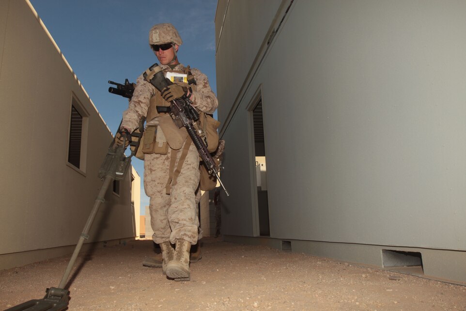 Private First Class Thomas Jenkins, a rifleman with Company I, 3rd Battalion, 4th Marine Regiment, sweeps for improvised explosive devices March 14, 2011 at the Combat Center’s Range 800. “The Darkside,” as the unit is known, is preparing to deploy to Afghanistan later this year in support of Operation Enduring Freedom.