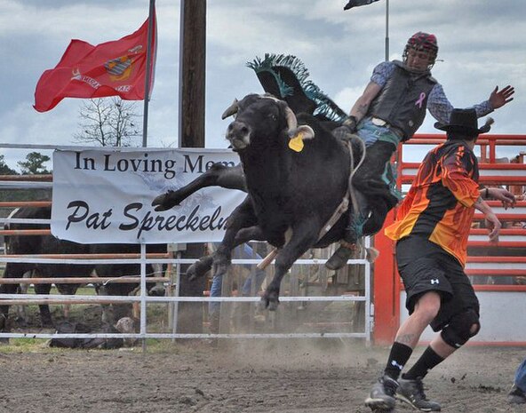 Cpl. Christopher Skeeters, a motor transportation operator with Landing Support Company, Combat Logistics Regiment 27, 2nd Marine Logistics Group, rides his favorite bull, Doc Holiday, at Hang’n Tree Ranch in New Bern, N.C., March 5, 2011.  Skeeters has been riding bulls for three years.(Courtesy Photo