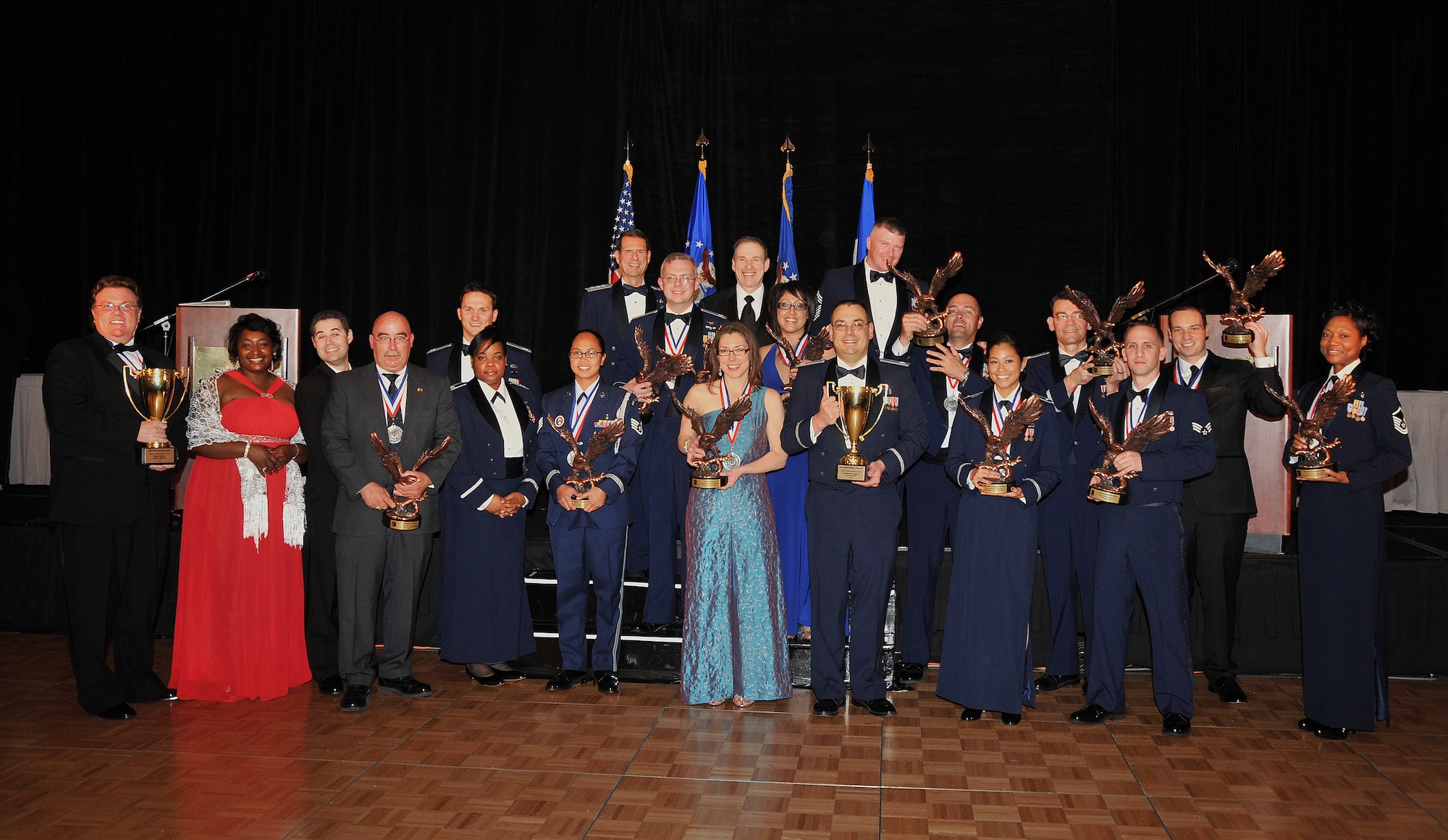 SMC’s 2010 Annual Award winners are joined by Lt. Gen. Tom Sheridan, SMC commander, for a group photo, March 11. Awards were presented in 16 categories at the black tie event. (Photo by Lou Hernandez)