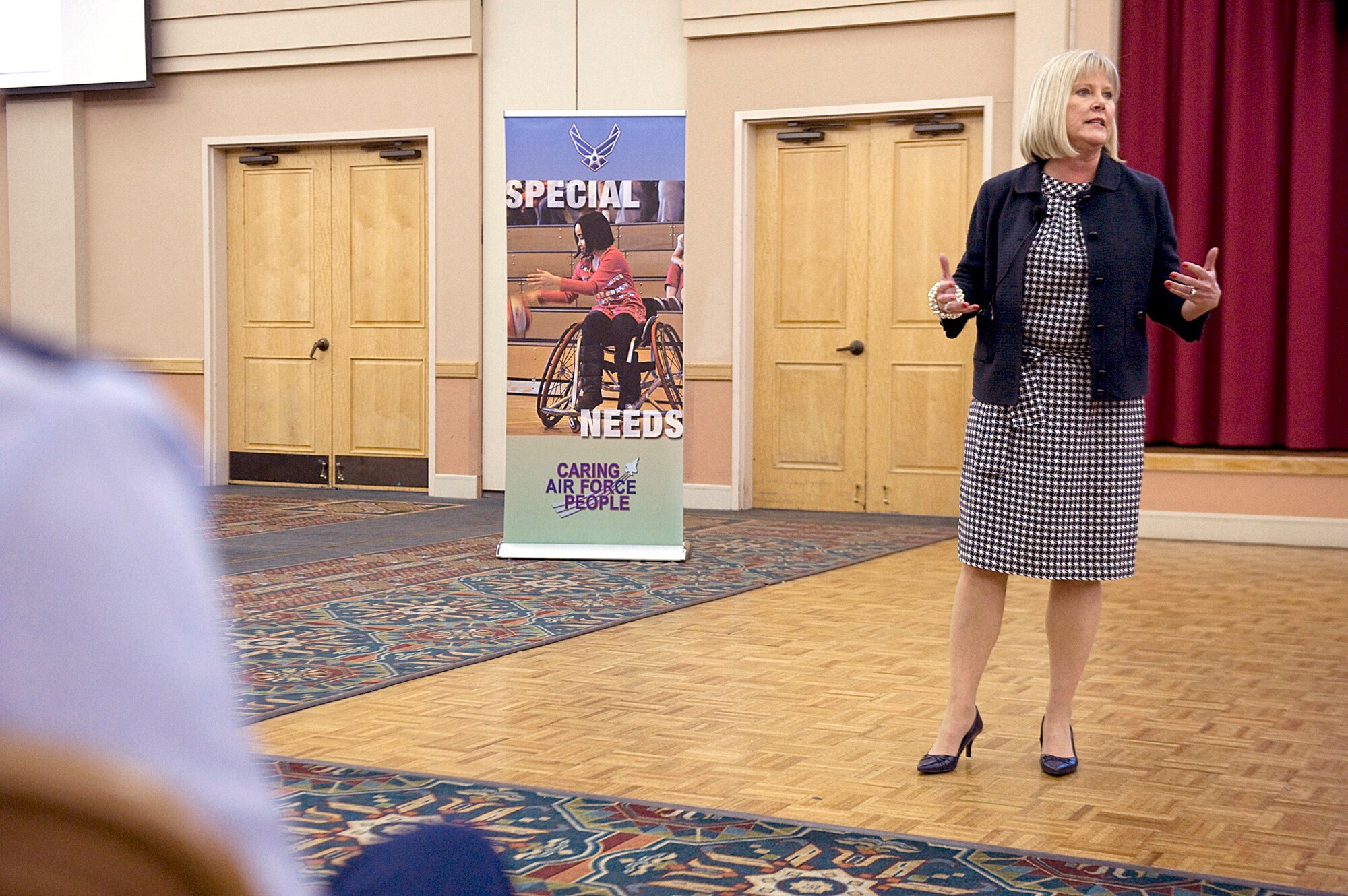 Suzie Schwartz answers question during the Exceptional Family Member Program and School Liaison Officer training course Mar. 10, 2011, at Lackland Air Force Base, San Antonio.  The two programs are geared toward taking care of families with special needs and childhood education respectively. Mrs. Schwartz is the wife of Air Force Chief of Staff Gen. Norton Schwartz. (U.S. Air Force photo/Staff Sgt. Desiree N. Palacios) 