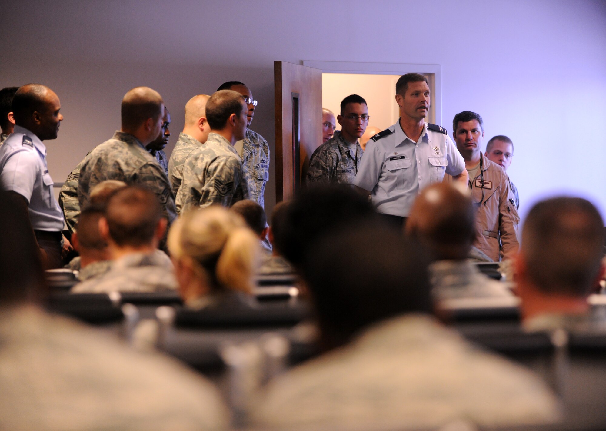 MOODY AIR FORCE BASE, Ga.-- Col. Gary Henderson, 23rd Wing commander, wishes luck and a safe return to members of the 23rd Maintenance Group before they deploy to Afghanistan March 14. Moody leadership came out to support the 23rd MXG personnel before the aircraft departed. (U.S. Air Force photo/Airman 1st Class Benjamin Wiseman)(RELEASED)