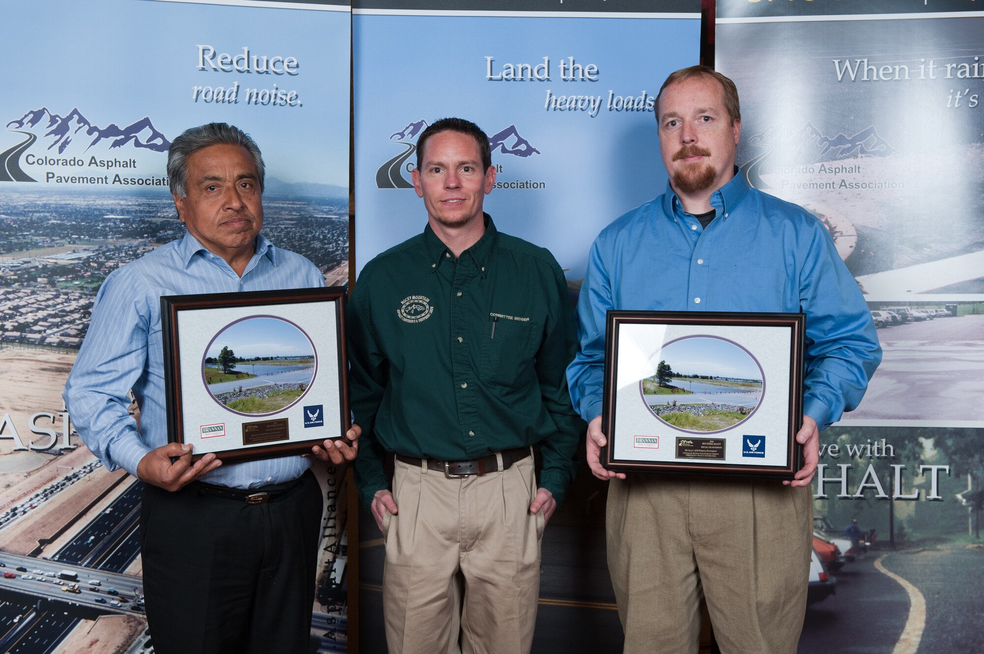 Denver, Colo.- Receiving the award on behalf of Brannan was Abraham Perez - PavingSuperintendent, and Jared Welch - Quality Control Manager.  Buckley AirForce Base was represented by Michael Bock, 460th Civil Engineer Squadron's Restoration Program Manager. 
