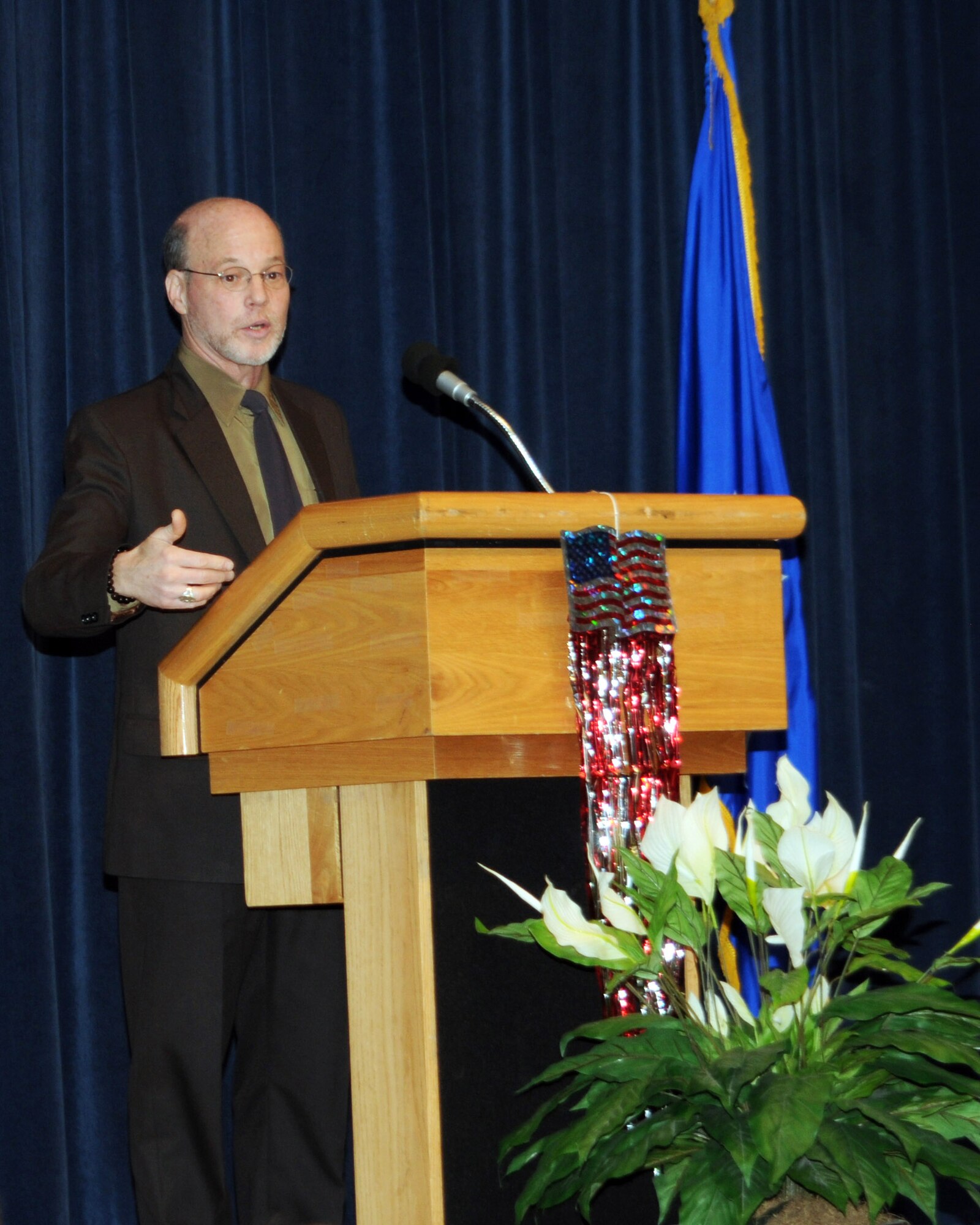 ALTUS AIR FORCE BASE, Okla. -- Dr. Edward Tick, Soldier's Heart director, gave a presentation at the Freedom Community Center here Mar. 10. Dr. Tick spoke about helping those with post-traumatic stress disorder and that there is hope for healing. The luncheon was sponsored by the YMCA here.  (U.S. Air Force photo by Airman 1st Class Kenneth W. Norman/ Released 97th Air Mobility Wing Public Affairs.)