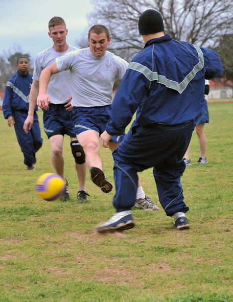 Members of the 26th Operational Weather Squadron play soccer at Barksdale Air Force Base, La., March 14. Soccer is one of the many physical activities that the Barksdale Fitness Center has to offer. The fitness centers hours are: 4 a.m. to midnight Monday through Friday, 8 a.m. to 6 p.m. on Saturday and 10 a.m. to 6 p.m. on Sunday. (U.S. Air Force photo/Airman 1st Class Micaiah Anthony)(RELEASED)