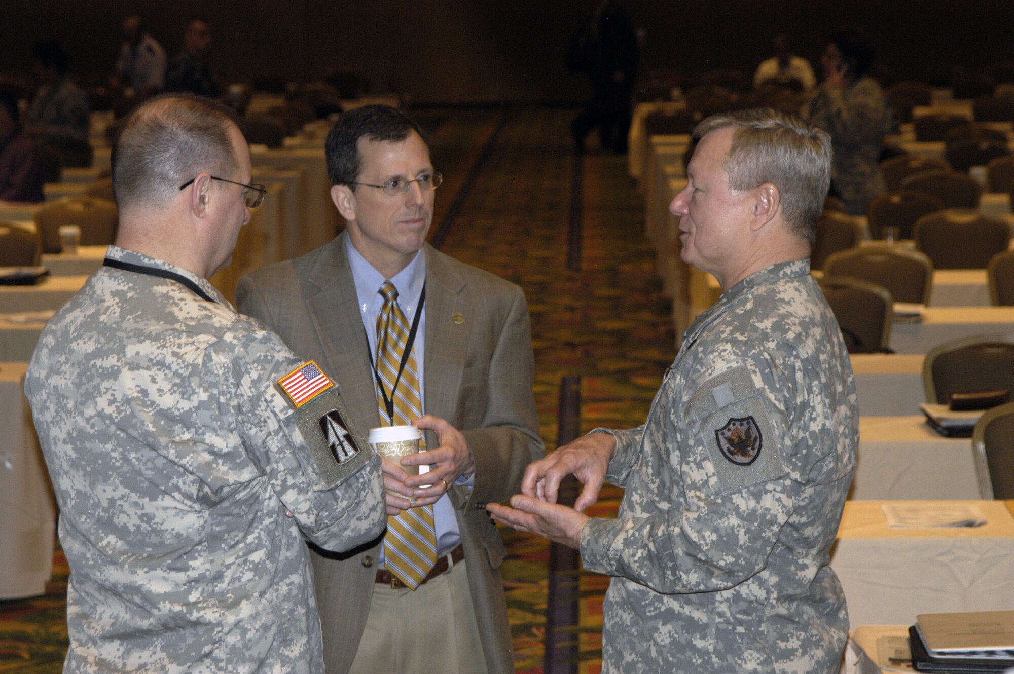 Lt. Gen. Frank Grass (right), deputy commander of U.S. Northern Command discusses USNORTHCOM’s role of responding to emerging disasters and the importance of synchronized efforts during major contingencies with attendees at the 2nd Annual National Joint Defense Support of Civil Authorities Symposium hosted by Air Forces Northern in Orlando Fla., March 7-11, 2011.   (U.S. Air Force photo by Lt. Col. Susan A. Romano)