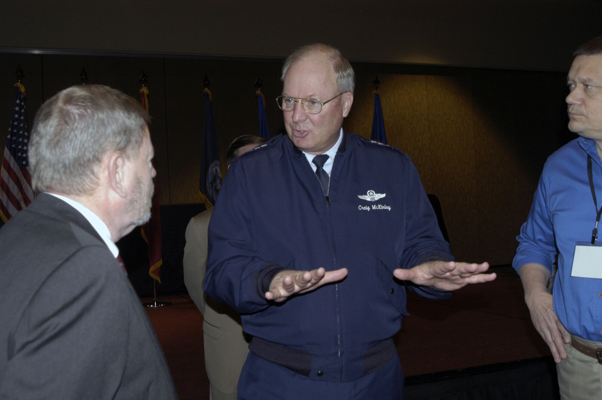 Gen. Craig McKinley, chief of the National Guard Bureau, chats with attendees at the 2nd Annual National Joint Defense Support of Civil Authorities Symposium hosted by Air Forces Northern in Orlando, Fla.  During the symposium, McKinley stated, “We are all partners, and it is critical that each of you establish personal relationships with people and agencies who respond to disasters that happen to our nation.”  (U.S. Air Force photo by Lt. Col. Susan A. Romano)
