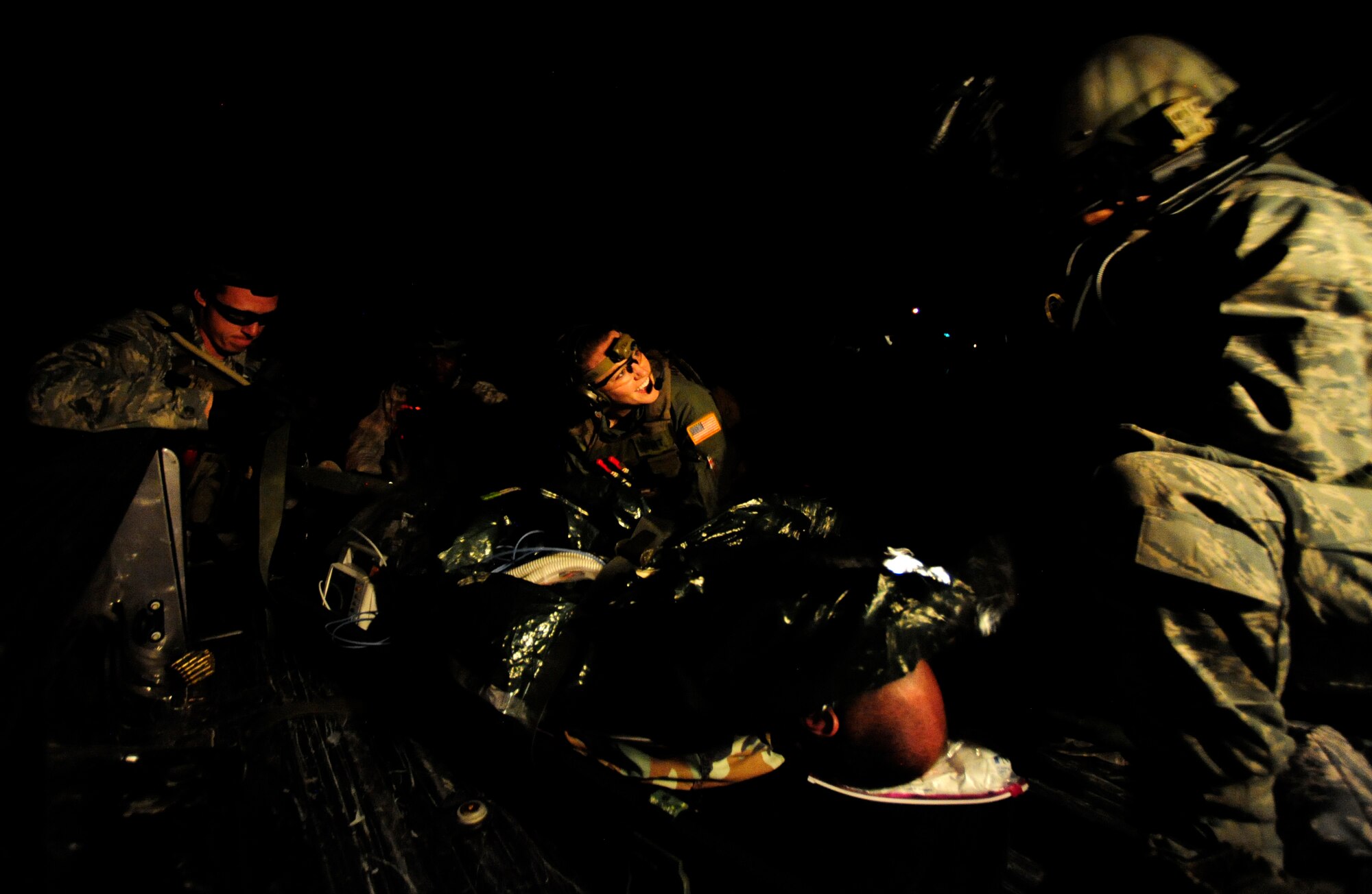 U.S. Air Force Staff Sgt. Nikki Spickerman, an Independent Duty Medical Tech (IDMT) assigned to the 1st Special Operations Support Squadron Hurlburt Field Fla., hangs medical supplies aboard a MC-130H Combat Talon II during an aeromedical evacuation mission during Emerald Warrior 2011. Emerald Warrior 2011 on March 1, 2011. Emerald Warrior 2011 is a U.S. Special Operations Command-sponsored, multiservice exercise designed to leverage lessons learned from Operations Iraqi Freedom and Enduring Freedom to provide trained and ready forces to combatant commanders.
(USAF photo by SSgt Andy M. Kin)(Released)