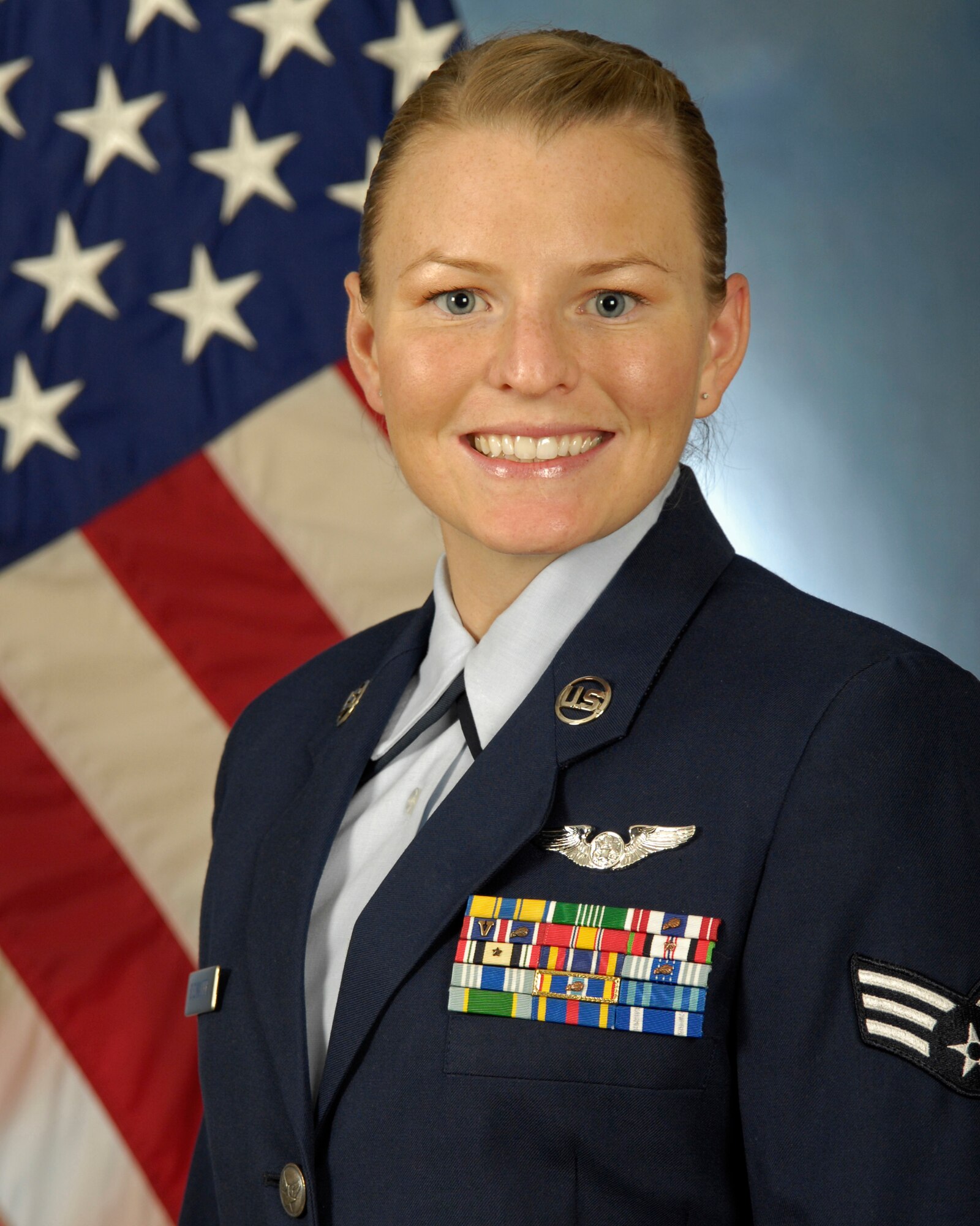 Staff Sgt. Julianne Showalter, 1st Special Operations Wing Public Affairs photographer, pictured here as a senior airman, poses for an official Air Force photo. Sergeant Showalter received both the Air Force Public Affairs Outstanding Communication Airman Award and the Air Force Public Affairs Alumni Association's "Best of the Best Award" for 2010. (U.S. Air Force photo / RELEASED)