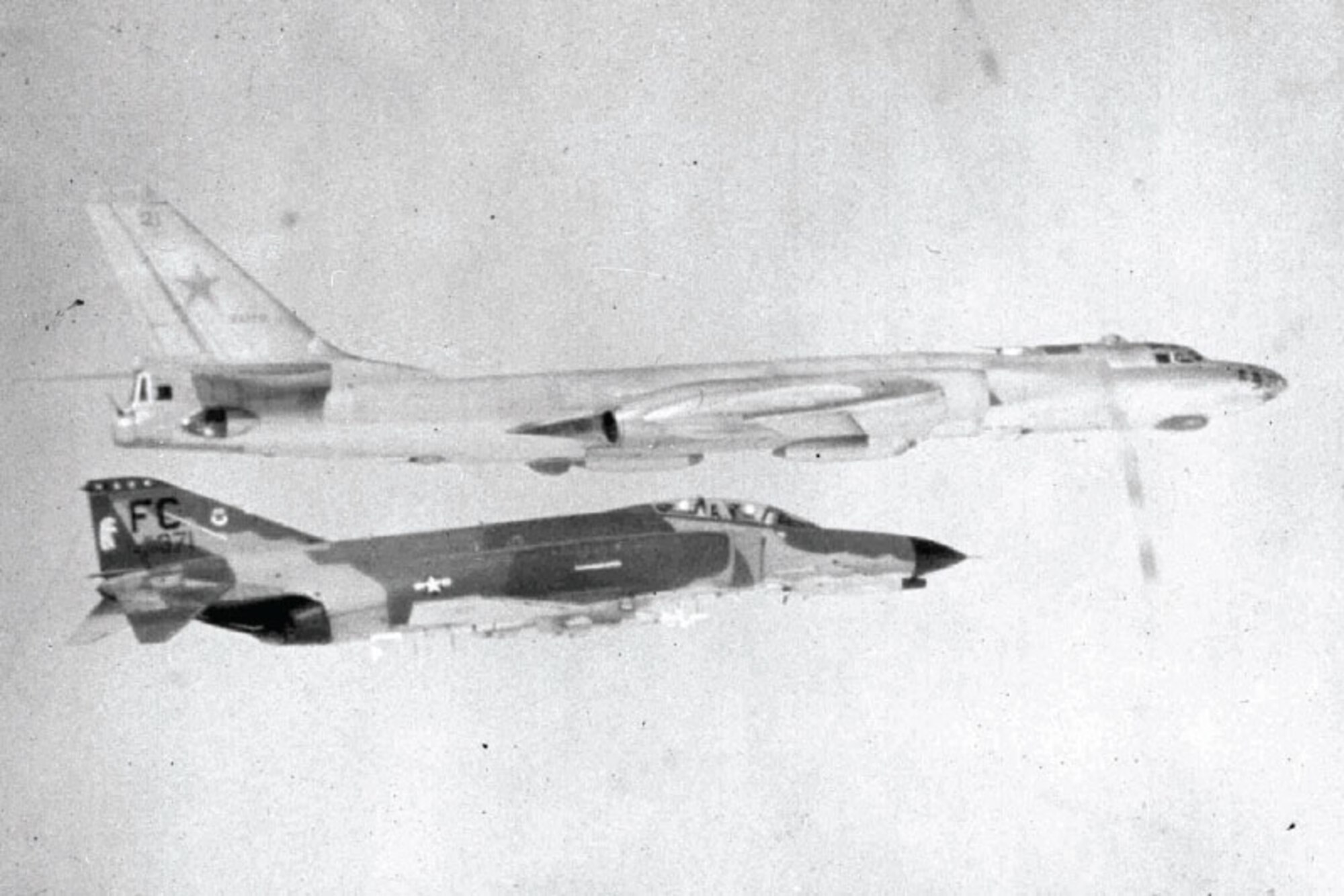 An F-4E Phantom, flying out of then Elmendorf Air Force Base, intercepts a TU-16 Badger bomber, Oct. 13, 1980. Interceptors have flown out of JBER’s Combat Alert Center since the 1950s. (Courtesy photo)