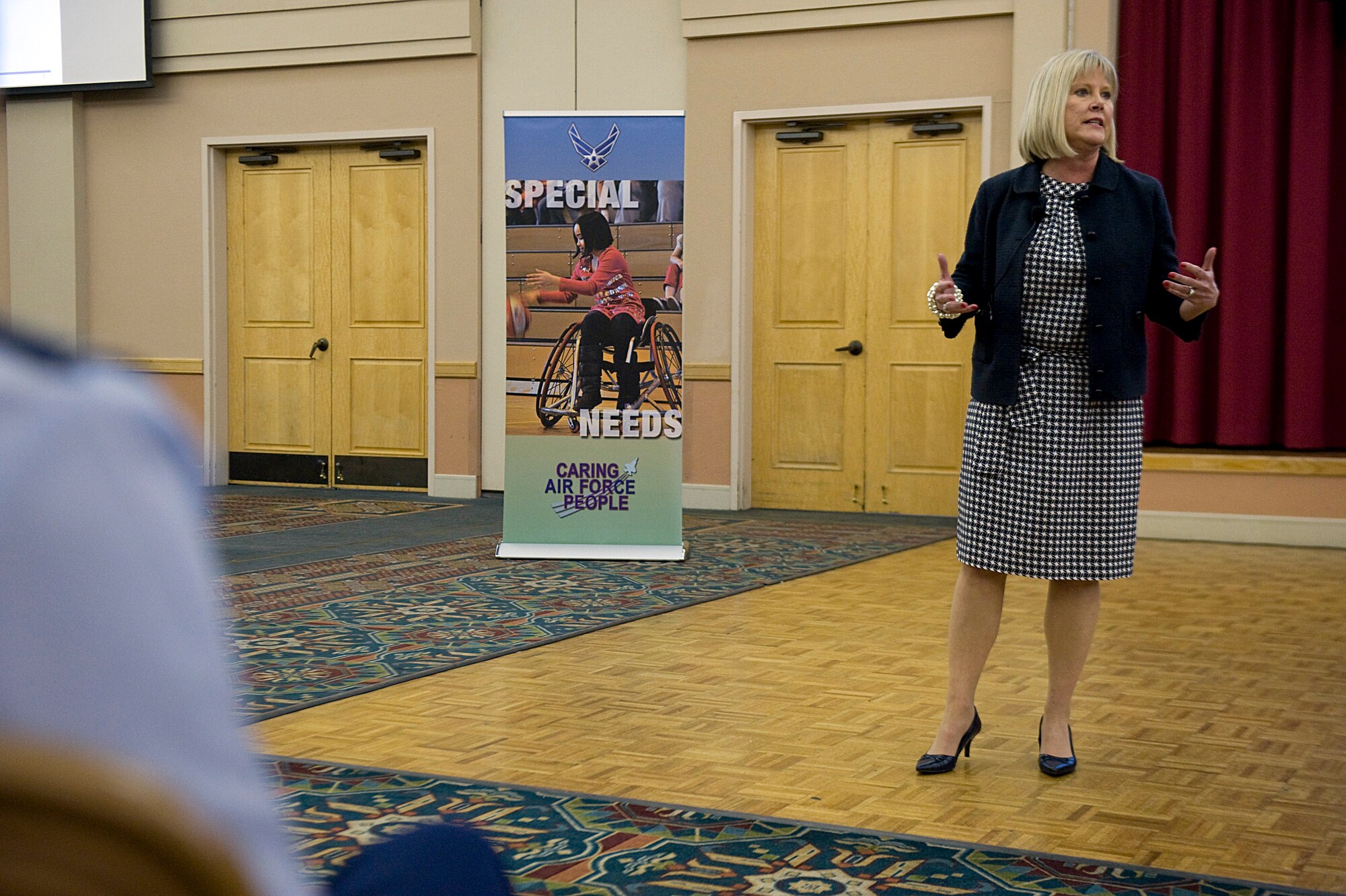 Suzie Schwartz answers question during the Exceptional Family Member Program (EFMP) and School Liaison Officer (SLO) training course Mar. 10, 2011, at the Lackland's Gateway Club, San Antonio, Texas. These two programs are geared toward taking care of families with special needs and childhood education respectively. Both tie into the larger picture of instilling a sense of AF community and Air Force Resilience. Mrs. Schwartz is the wife of Air Force Chief of Staff Gen. Norton Schwartz. (U.S. Air Force photo/Staff Sgt. Desiree N. Palacios)
