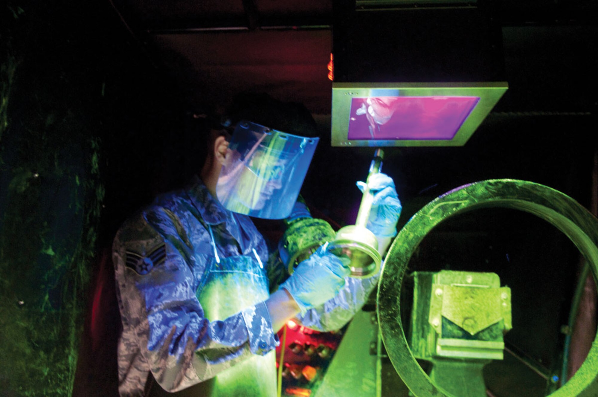 Senior Airman Robert King, 3rd EMS, A Non-destructive Inspection lab technician, 3rd Wing, conducts inspection on aircraft components. (U.S. Air Forec photo/Steven White)