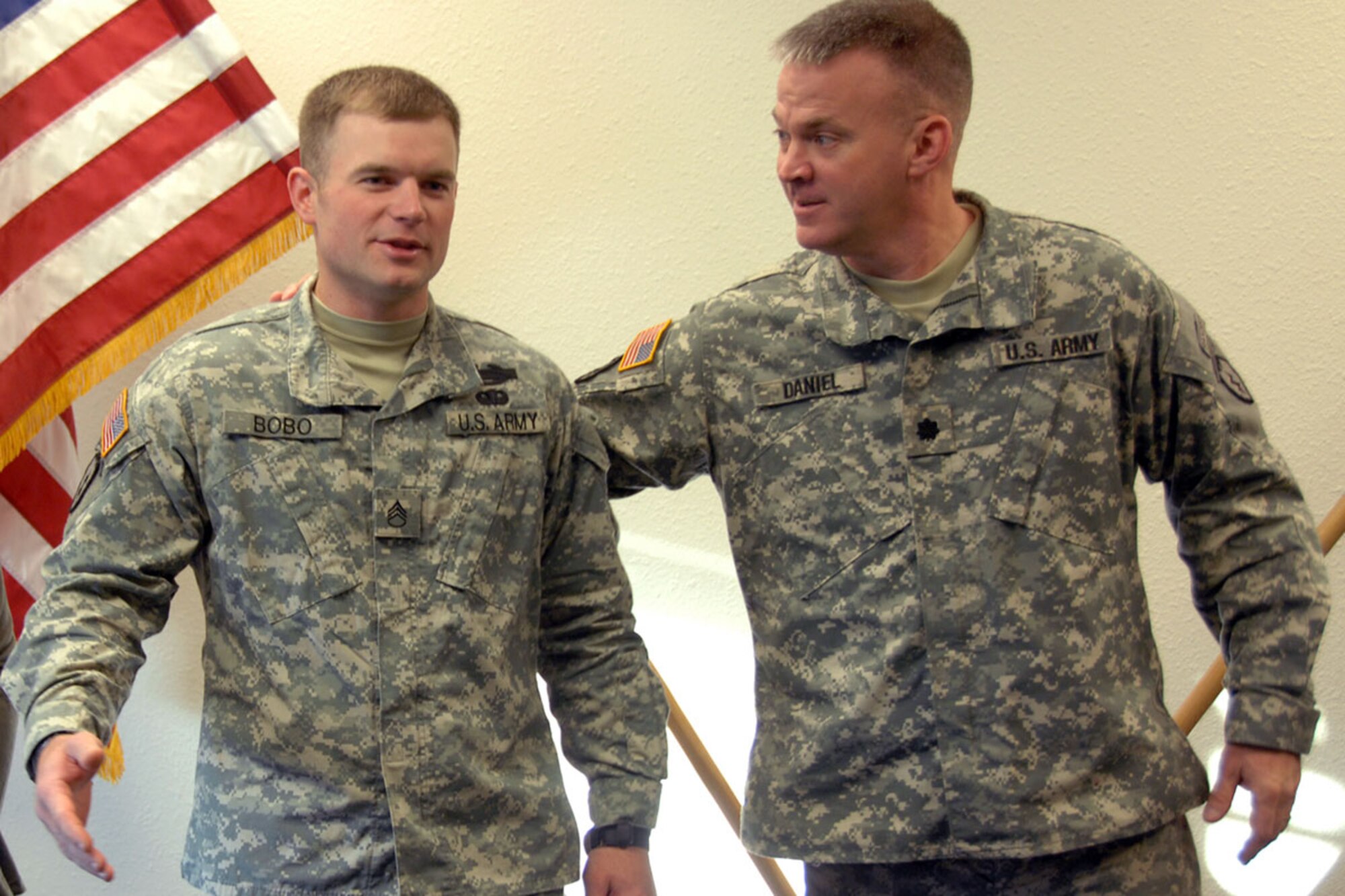 Lt. Col. Shawn Daniel 3rd Battalion, 509th Parachute Infantry Regiment commander, congratulates Staff Sgt. Jacob Bobo as he recounts details of the event for which he was awarded the Army Commendation Medal with “V” Device for Valor.  (U.S. Army photo/ Staff Sgt. Matthew E. Winstead)