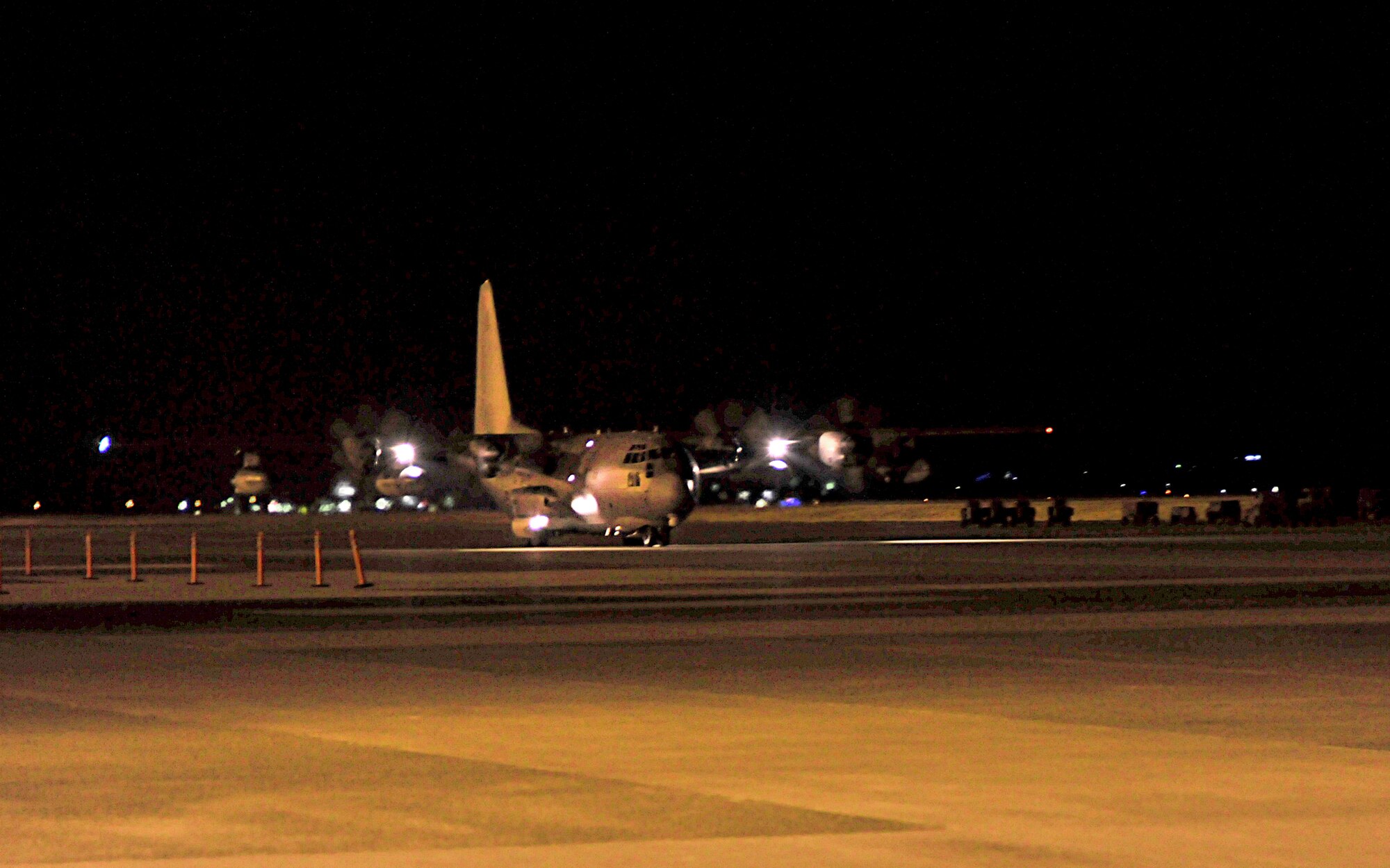 An MC-130P Combat Shadow carrying Airmen arrives March 13, 2011, at Yokota Air Base, Japan. The flight was part of American disaster relief forces to assist the earthquake and tsunami recovery effort. (U.S. Air Force photo/Airman 1st Class Andrea Salazar)