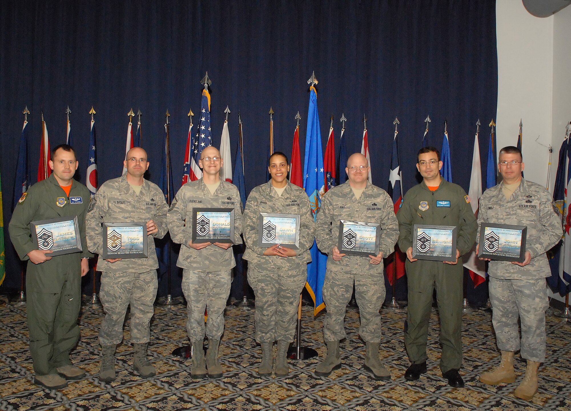 Team Dover’s senior master sergeant selects come together March 11, 2011, at The Landings Club at Dover Air Force Base, Del. Selectees are: (from left) Master Sgt. James Busbea, 9th Airlift Squadron; Master Sgt. Todd Stout, 436th Logistics Readiness Squadron; Master Sgt. Donald Cleveland, Air Force Mortuary Affairs Operations Center; Master Sgt. Dawn Byrd, 436th Maintenance Operations Squadron; Master Sgt. Scott Kay, 736th Aircraft Maintenance Squadron; Master Sgt. Benigno Rodriguez-Cintron, 9 AS; Master Sgt. John Tingle, 436th Civil Engineer Squadron. Master sergeants Patrick Piazza, 8th Logistics Readiness Squadron, Republic of Korea; and Ronald Schmidt, 9 AS, were unable to attend. (U.S. Air Force photo by Airman 1st Class Matthew Hubby)