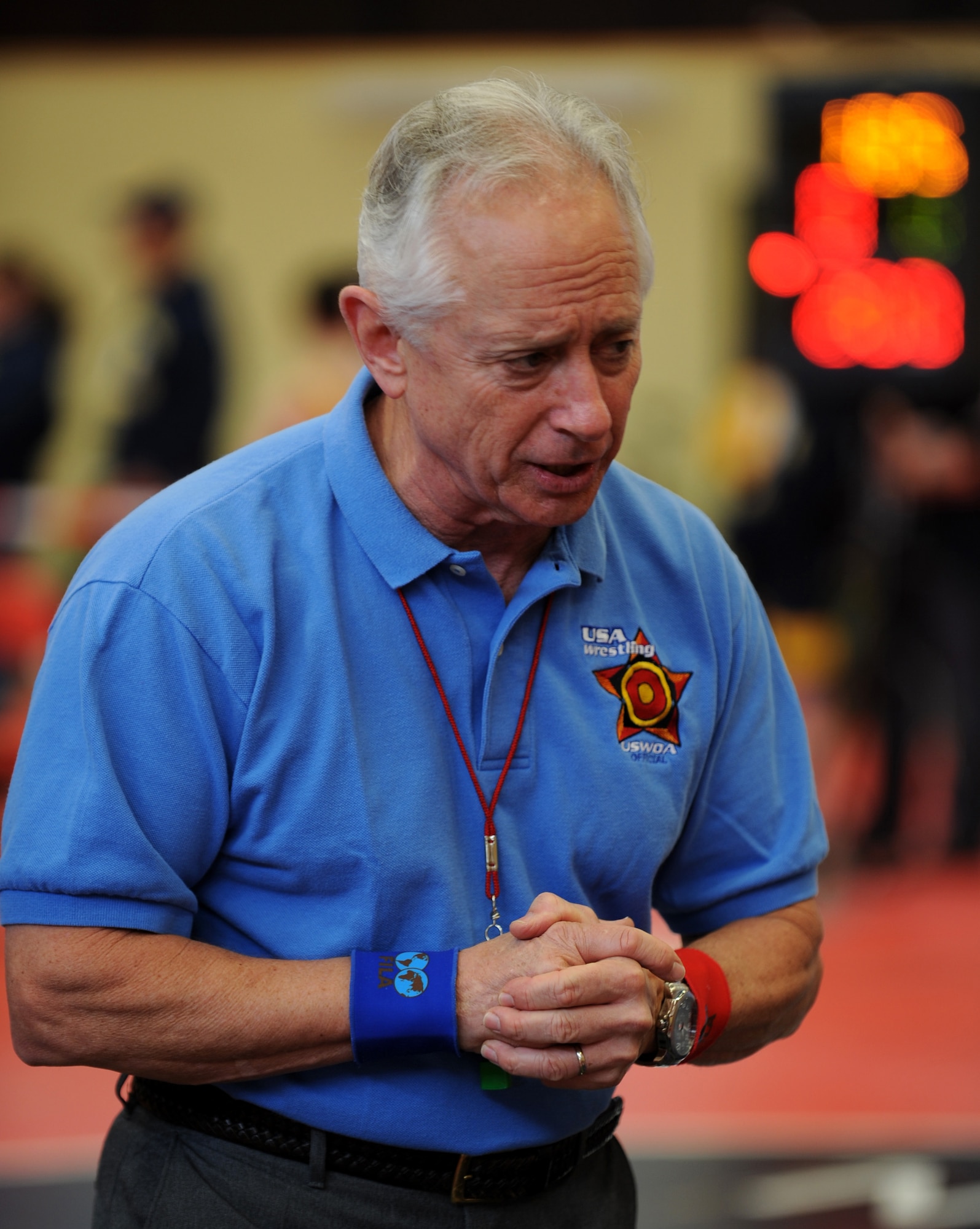 Jeff Pellaton, USA wrestling official, briefs wrestlers before the U.S. Army Garrison Kaiserslautern invitational, Miesau Army Depot, Germany, March 12, 2011.  Wrestlers from Ramstein, Aviano, K-town, Landstuhl Regional Medical Center, Baumholder, and Wiesbaden all took part in the invitational. Ramstein won the invitational with 102 points. (U.S. Air Force photo by Senior Airman Caleb Pierce)
