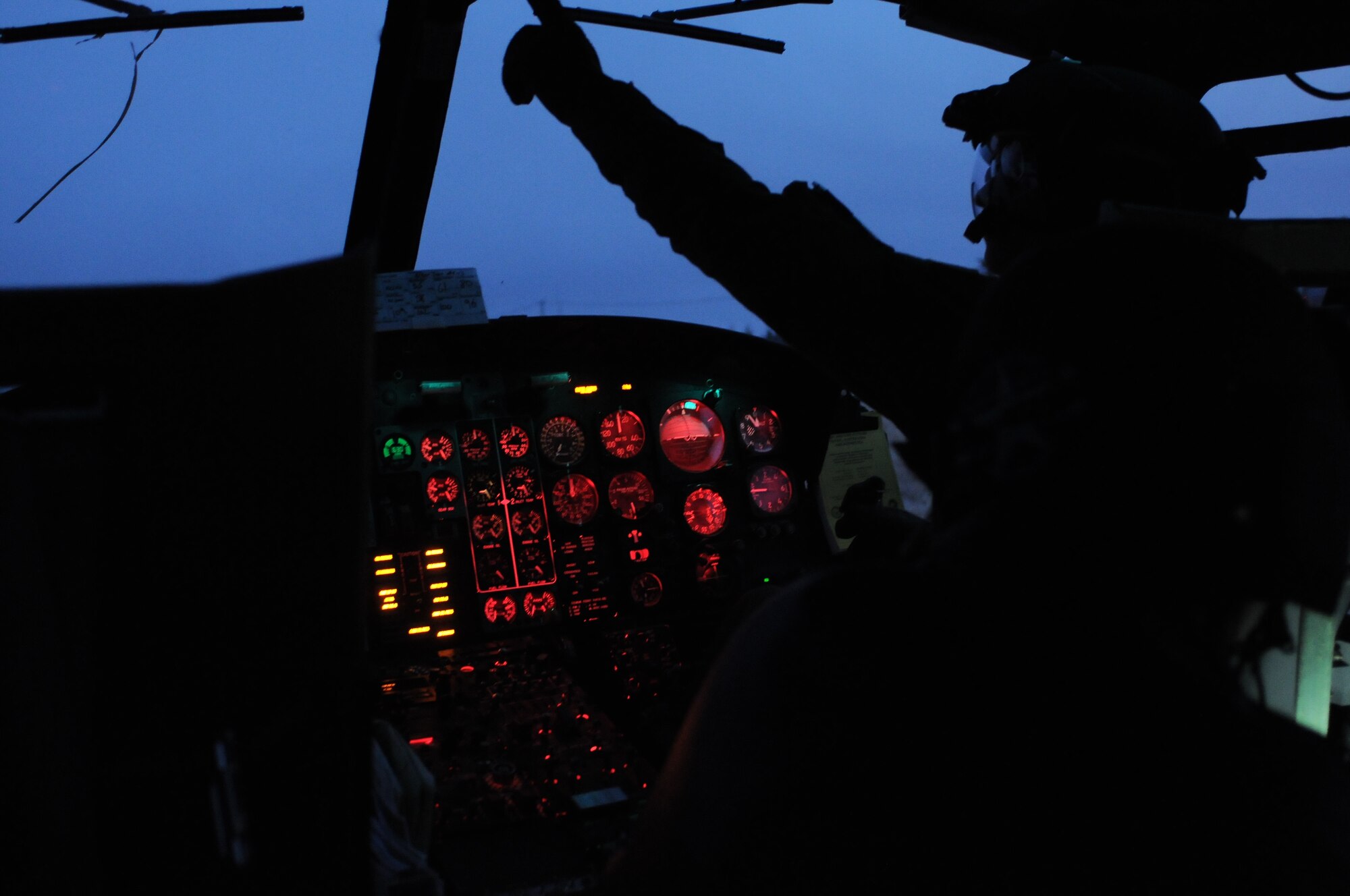 KASUMINOME AIRFIELD, Japan -- Capt. Matthew Sims, 459th Airlift Squadron UH-1N Iroquois pilot, prepares to head back to Yokota Air Base after refueling at Kasuminome Airfield March 13. UH-1N helicopters at Yokota Air Base normally provide base leadership fast and efficient means of transit to meetings and events in downtown Tokyo, but are currently being used to shuttle disaster relief personnel to locations along Japan’s East Coast. (U.S. Air Force photo/Airman 1st Class Krystal M. Garrett)