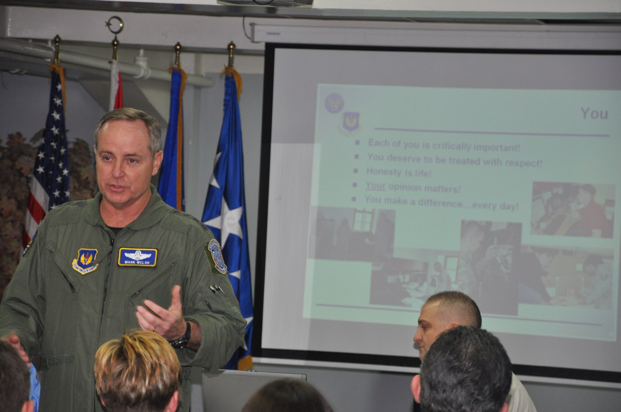Gen. Mark A Welsh III, U.S. Air Forces in Europe commander, speaks with Airmen from the 425th Air Base Squadron at the Izmir Collocated Club, March 8, 2011 in Izmir, Turkey. General Welsh visited the unit to gain insight into how its members accomplish its mission. (Courtesy photo)