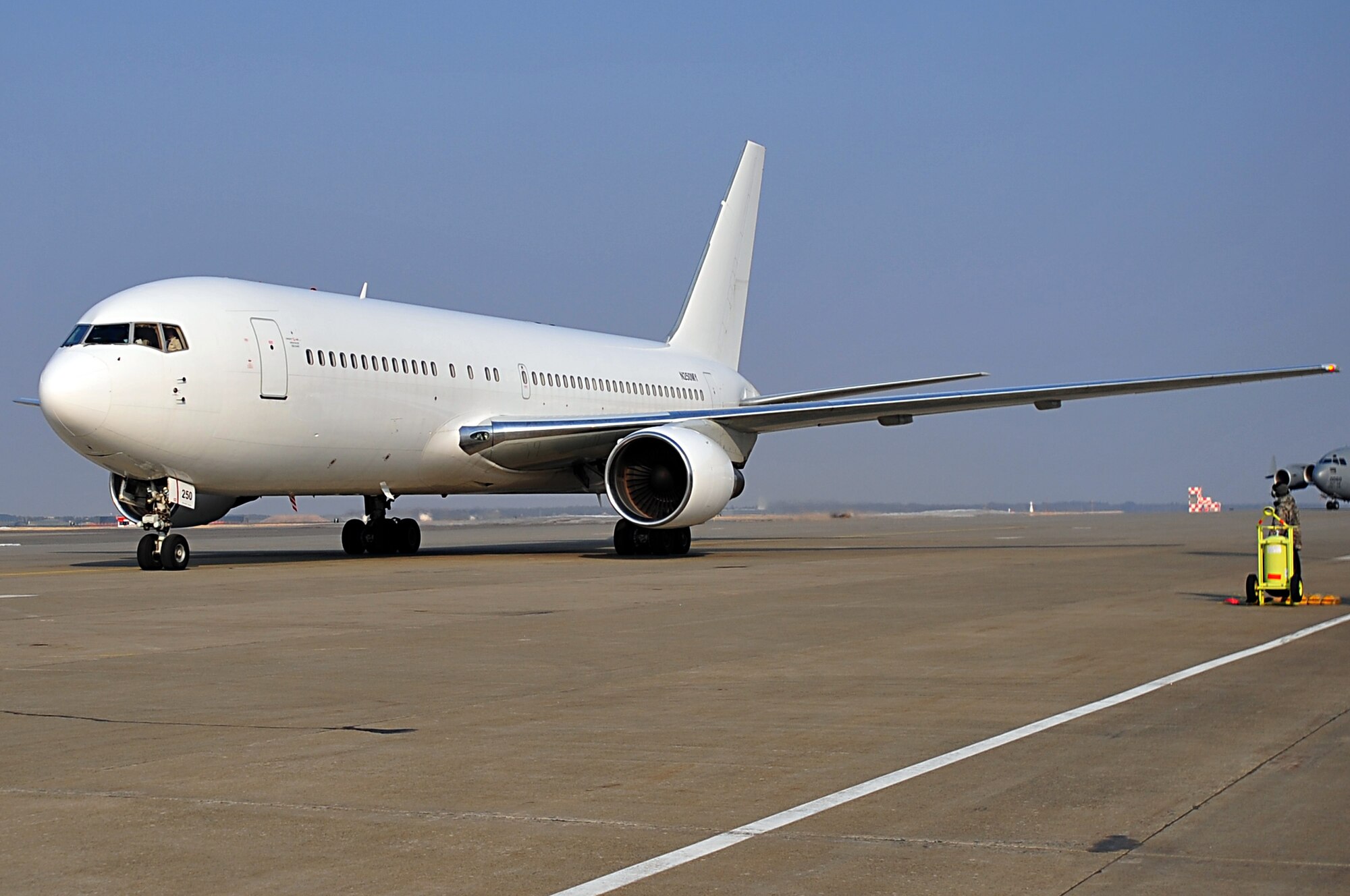 A Boeing 767 aircraft arrives carrying United States Agency for International Development search and rescue workers to assist in civil relief and recovery operations Mar. 13. The search and rescue teams are from the Los Angeles County Fire Department, Calif. and Fairfax County, Va. Urban Search and Rescue. (U.S. Air Force photo (U.S. Air Force photo by Staff Sgt. Marie Brown\Released)
