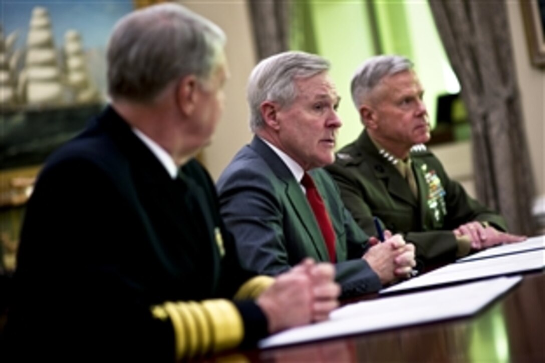 Chief of Naval Operations Navy Adm. Gary Roughead, left, Navy Secretary Ray Mabus and Commandant of the Marine Corps James F. Amos sign a Memorandum of Understanding for Tactical Air Integration in Washington, D.C., March 14, 2011. The agreement incorporates the Marine Corps' plan to provide five squadrons of F-35C Joint Strike Fighters to Navy carrier air wings.