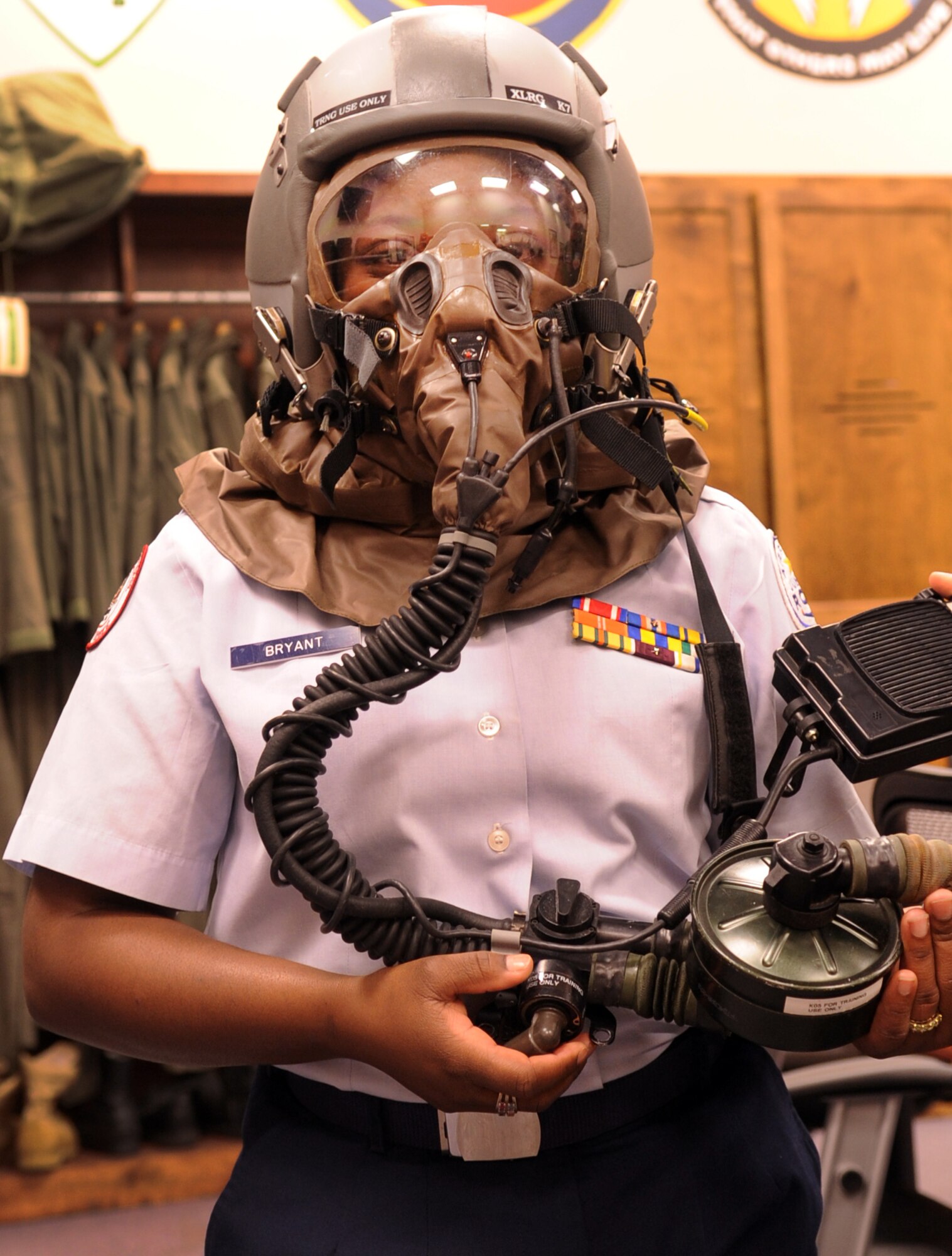 MOODY AIR FORCE BASE, Ga. -- Shamuya Bryant, Lowndes High School JROTC member, tries on some AERPS gear during a field trip March 15. Mrs. Bryant enjoyed wearing the mask and did not want to take it off. (U.S. Air Force photo/Airman 1st Class Douglas Ellis)(RELEASED)
