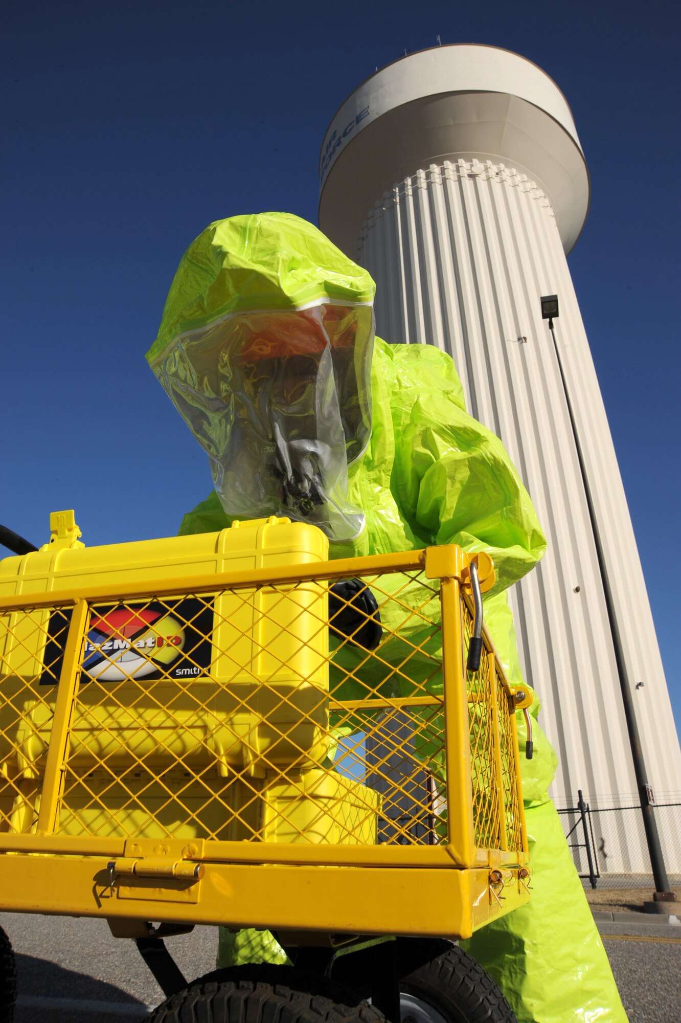 Staff Sgt. Randy Golleher, 22nd Civil Engineer Squadron firefighter, checks an unknown liquid for hazardous materials during a major accident response exercise, March 10, 2011, McConnell Air Force Base, Kan. Sergeant Golleher used a device called a “HAZMAT-ID” to identify the substance he was testing. The MARE, a tornado scenario, tested McConnell’s preparedness to handle a major emergency. (U.S. Air Force photo/Staff Sgt. Dallas Edwards)