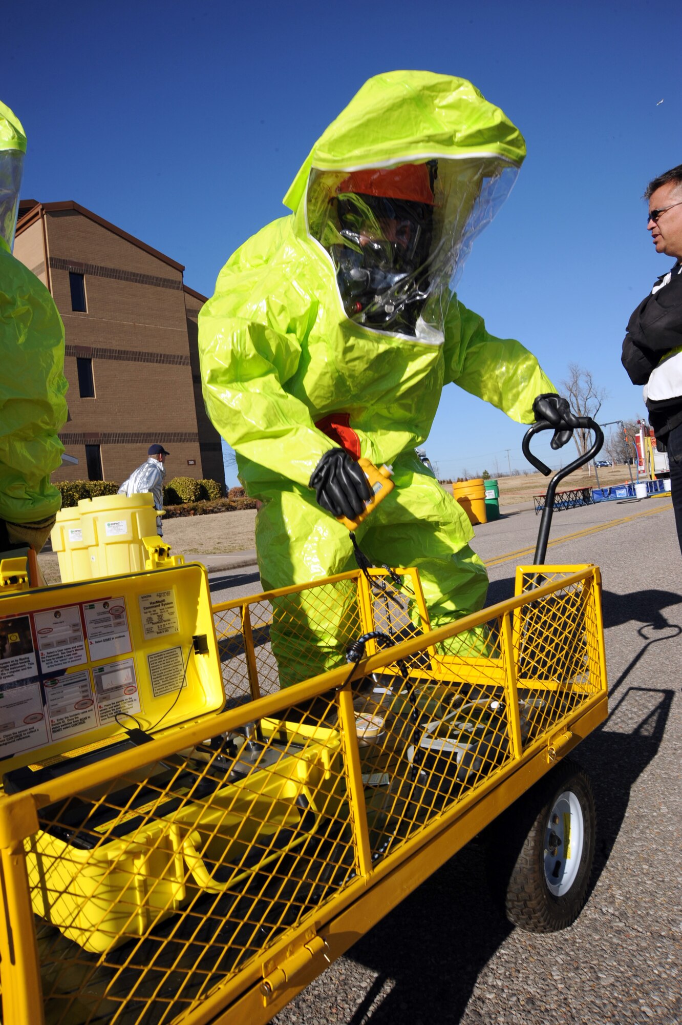 Staff Sgt. Randy Golleher, 22nd Civil Engineer Squadron emergency management craftsman, prepares a wagon containing hazardous materials detection equipment for an automobile crash site during a major accident response exercise, March 10, 2011, McConnell Air Force Base Kan. The MARE simulated a tornado touching down on the base causing multiple injuries to personnel and possible HAZMAT spills. (U.S. Air Force photo/Staff Sgt. Dallas Edwards)