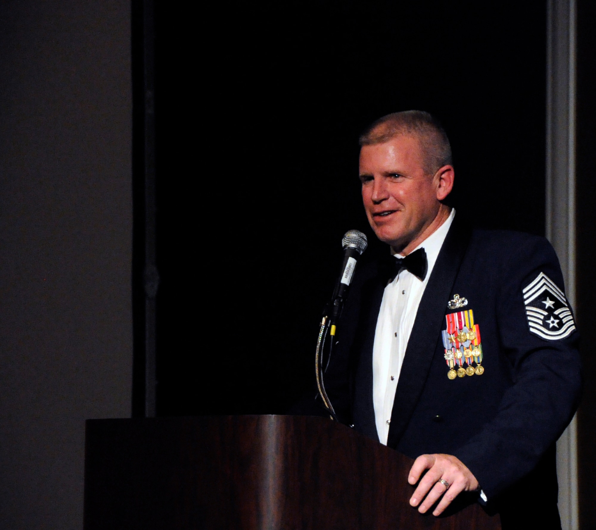 Chief Master Sgt. Harold Clark, 12th Air Force (Air Forces Southern) command chief, introduces the night's guest speaker, Former Chief Master Sergeant of the Air Force Rodney Mckinley, to the 12th AF Outstanding Performer of the Year banquet attendees in Las Vegas Feb. 23.