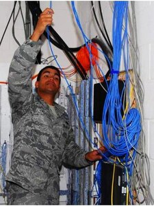 Staff Sgt. Creighton Chilcote is deployed from the 82nd Communications Squadron at Langley Air Force Base, Va., to serve with the 405th Air Expeditionary Group, 405th Expeditionary Support Squadron Communications Flight in Southwest Asia. As the NCO in charge of the inside/outside communications plant, he engineers, installs, maintains and repairs all base cabling, to include fiber optics, coax, cat5 and copper, for unclassified and classified systems.  (Courtesy photo)