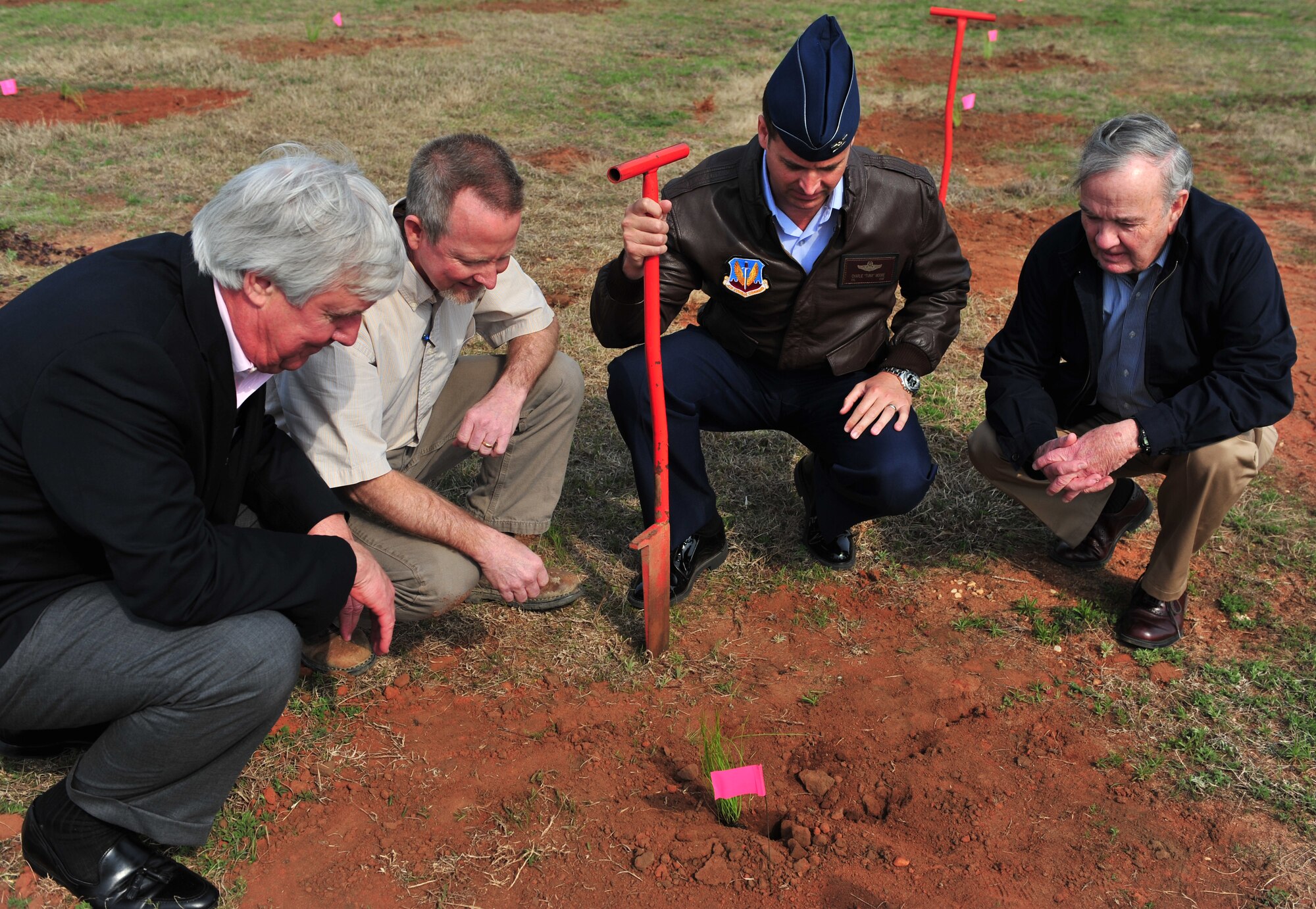SHAW AIR FORCE BASE, S.C. -  (left to right) Former Sumter Mayor Steve Creech, chariman of the Sumter Chamber of Commerce Military Affairs Committee; Preston Fout, American Forest Management; Col. Charlie Moore, 20th Fighter Wing commander; and Bo Shaw, founder and director of American Forest Management, break ground for the planting of 1,000 longleaf pines around base March 14, 2011. Mr. Creech and Mr. Shaw worked together to purchase and donate the trees for the project.  (U.S. Air Force photo/Airman 1st Class Amber E. N. Jacobs (Released))
