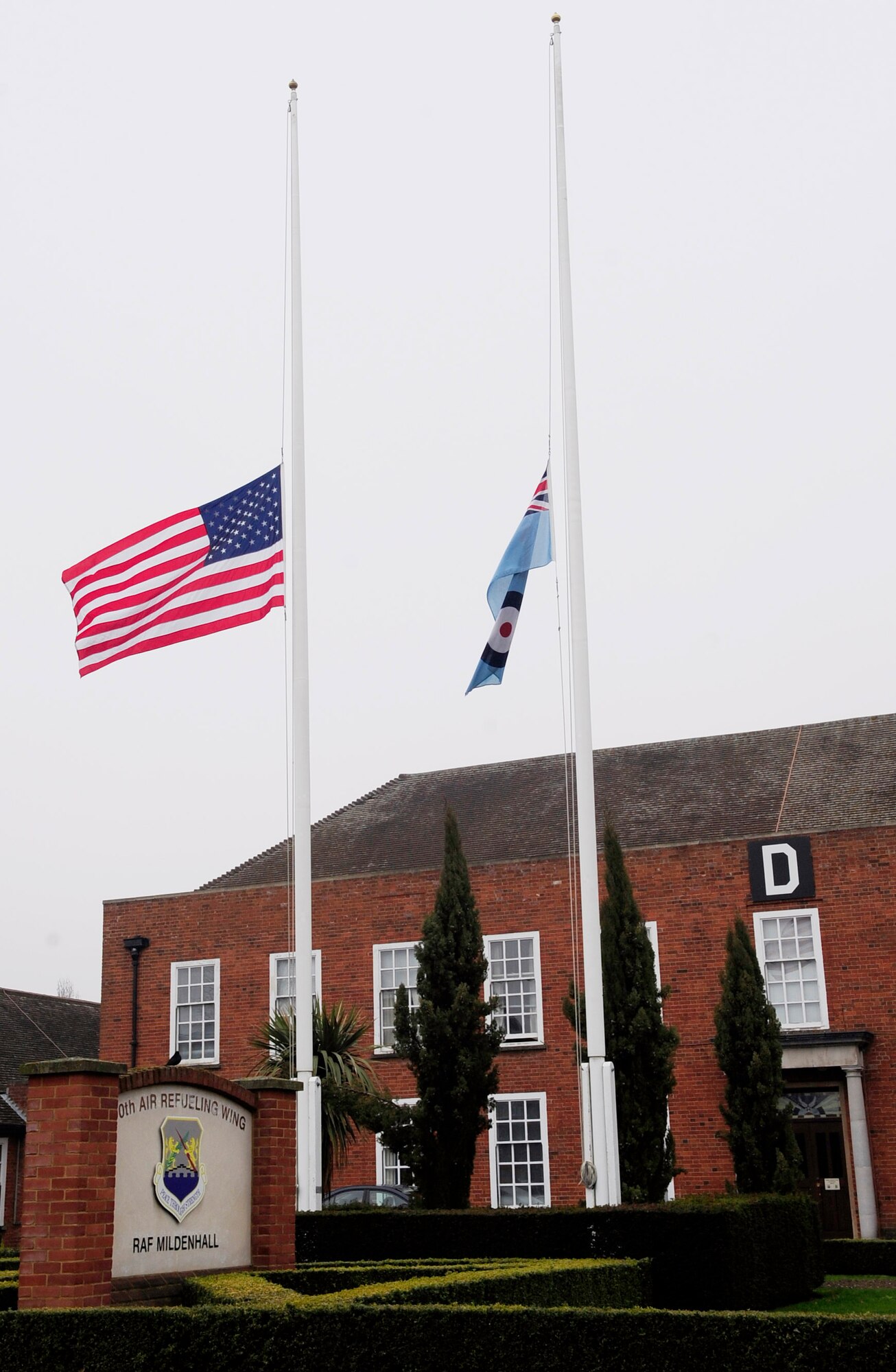 RAF MILDENHALL, England -- The flags were flown at half-staff here March 15, 2011, honoring Army Cpl. Frank W. Buckles and in remembrance of the Generation of American Veterans of World War I.  Corporal Buckles, who died at the age 110 on Feb. 27, 2011, was the last surviving American veteran of World War I. (U.S. Air Force photo/Senior Airman Ethan Morgan)