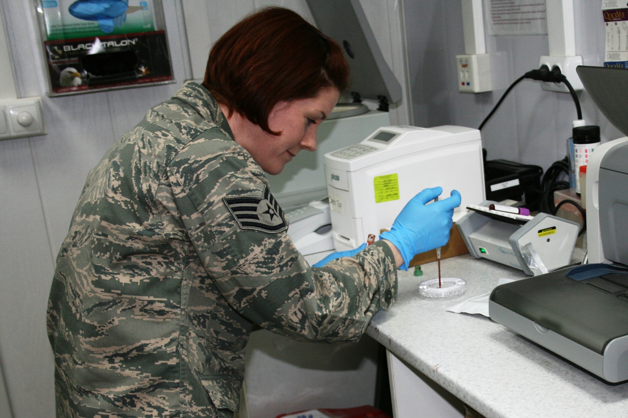 Staff Sgt. Magen Harger deployed from the 633d Medical Group Medical Support Squadron at Langley Air Force Base, Va., to serve as the chief of Laboratory Medicine for the 376th Expeditionary Medical Group in Transit Center Manas, Kyrgyzstan. As the sole medical laboratory technician, she is responsible for all patient testing as well as maintaining the Transit Center blood supply. (Courtesy photo) 