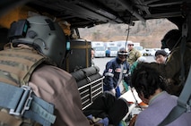 SENDAI, Japan -- A Japanese Disaster Medical Assistance Team offloads an earthquake victim from a U.S. Air Force HH-60G helicopter March 14. Search and rescue personnel transported the injured man from a remote island to a nearby hospital for treatment. (U.S. Air Force photo/Airman 1st Class Katrina R. Menchaca)