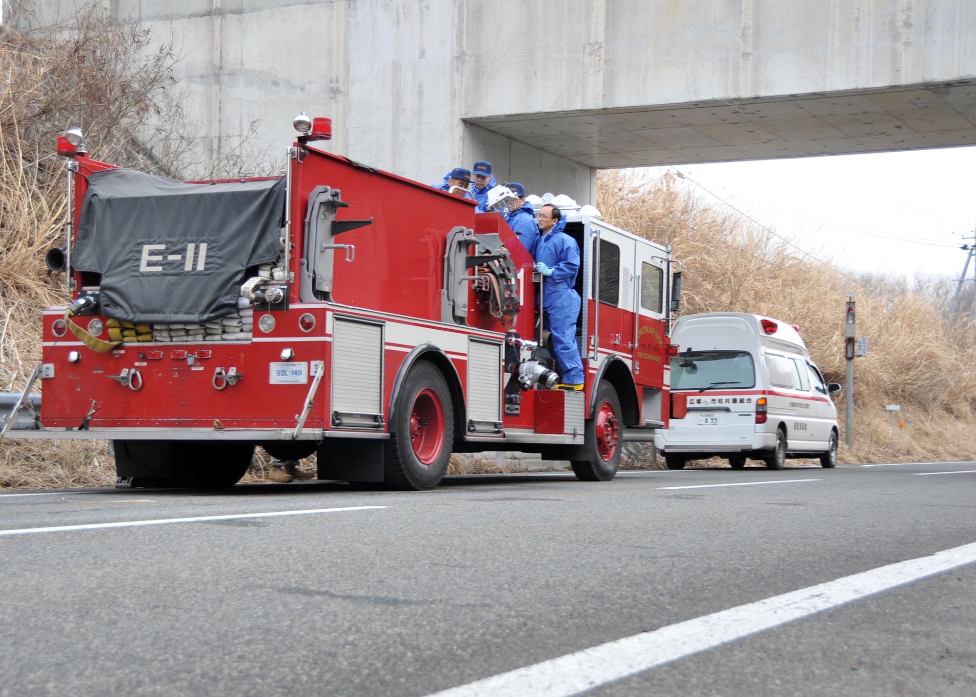 YOKOTA AIR BASE, Japan – Japanese firefighters in Fukushima examine the control systems on a Yokota fire truck March 15. The truck was delivered early in the morning and will be used to assist with recovery efforts in northern Japan following the earthquake and tsunami March 11. (U.S. Air Force/Airman 1st Class Andrea Salazar)
