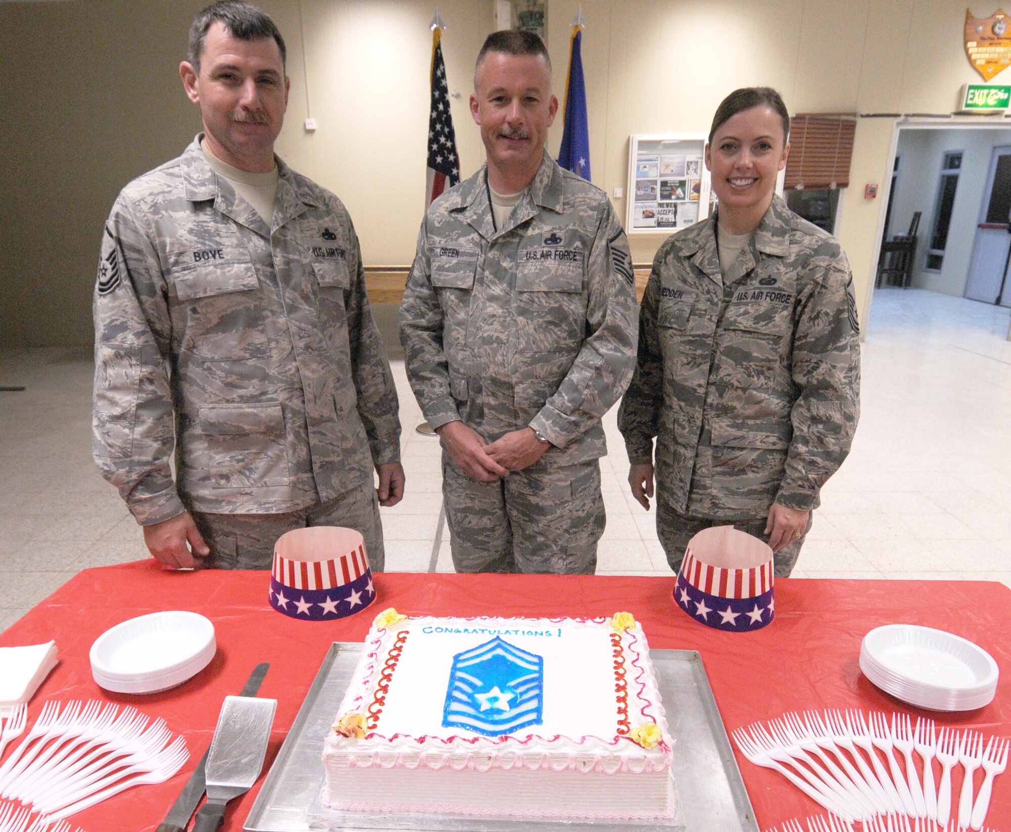 Master Sergeants James Bove, Chad Green and Jennifer Hedden were selected to the rank of senior master sergeant, and celebrated during a party March 11 at an undisclosed location in Southwest Asia. Sergeants Bove and Green are both members of the 386th Expeditionary Aircraft Maintenance Squadron and Sergeant Hedden is a member of the 386th Expeditionary Force Support Squadron. (U.S. Air Force photo by Staff Sgt. Patrice Clarke)