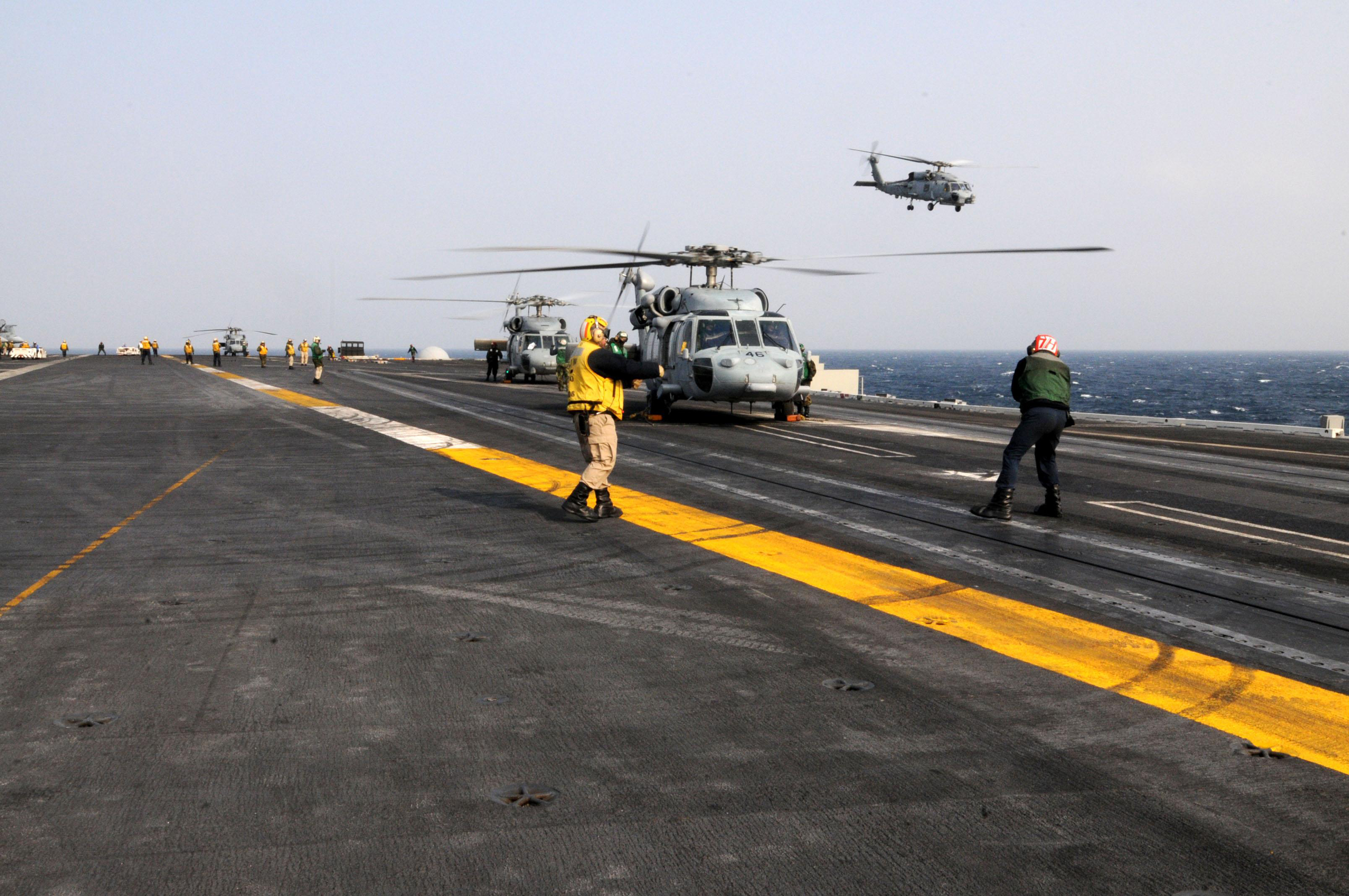 Photo Gallery Us Navy Seahawk Helicopters Prepare To Take Off From The Aircraft Carrier Uss Ronald Reagan In The Pacific Ocean March To Provide Humanitarian Example Of Essay With Thesis Statement also Business Proposal Writing Service Calculus Help