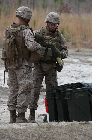 Marines load gear and humanitarian aid supplies onto a C-12 for transport to Atsugi, Japan, in support of Operation Tomodachi here March 16. MCAS Iwakuni is an essential strategic co-located air and sea port supporting Operation Tomodachi as a logistical and resupply hub.
