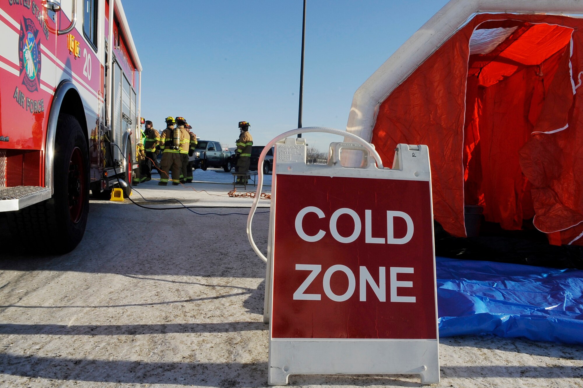 Emergency first responders set up decontamination tents during an operational readiness exercise March 11, 2011, Eielson Air Force Base, Alaska. The exercise accesses how Airmen use their skills while providing emergency healthcare in a simulated heightened threat environment. (U.S. Air Force photo/Airman 1st Class Laura Goodgame)